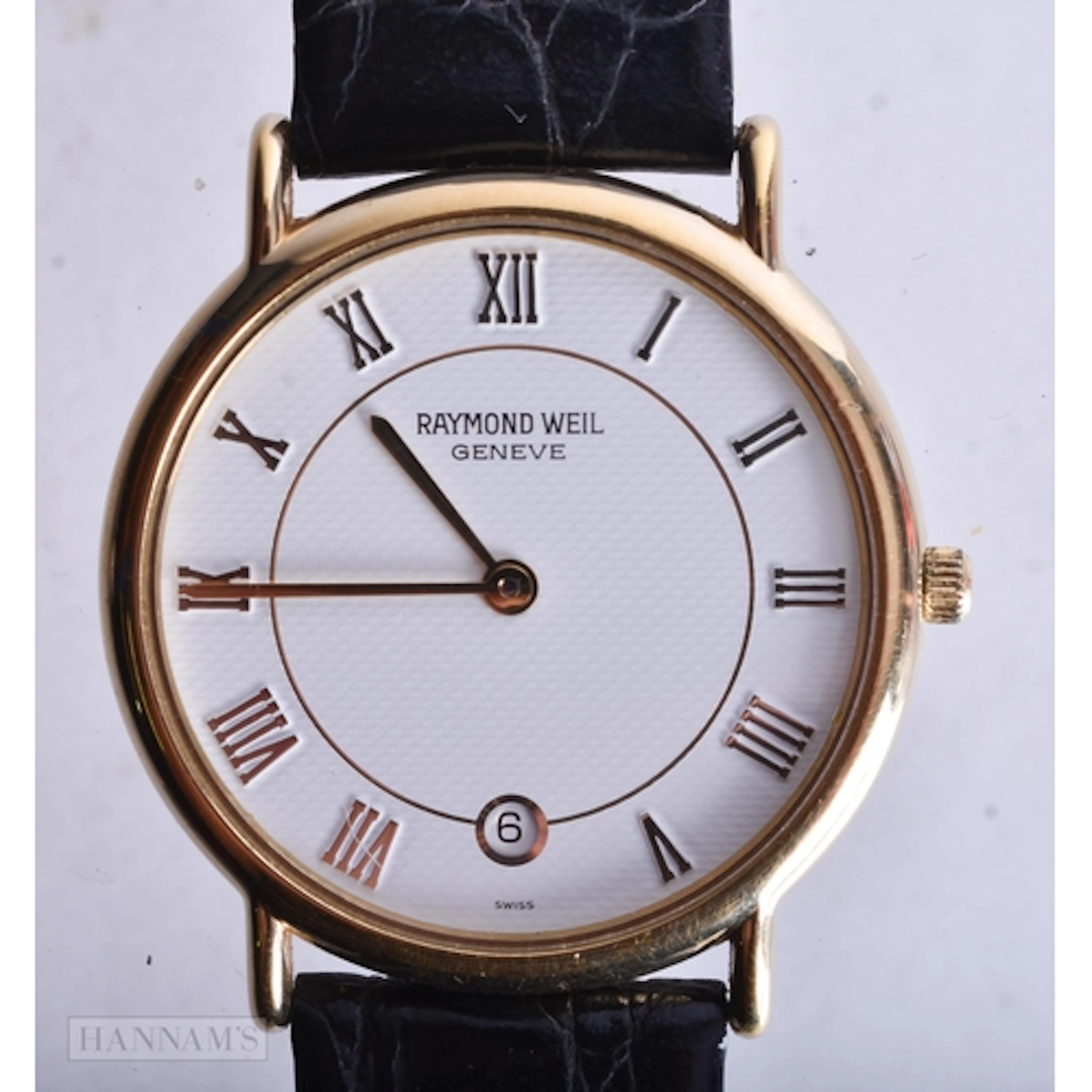 A RAYMOND WEIL WRIST WATCH. Untested. 3 cm wide.