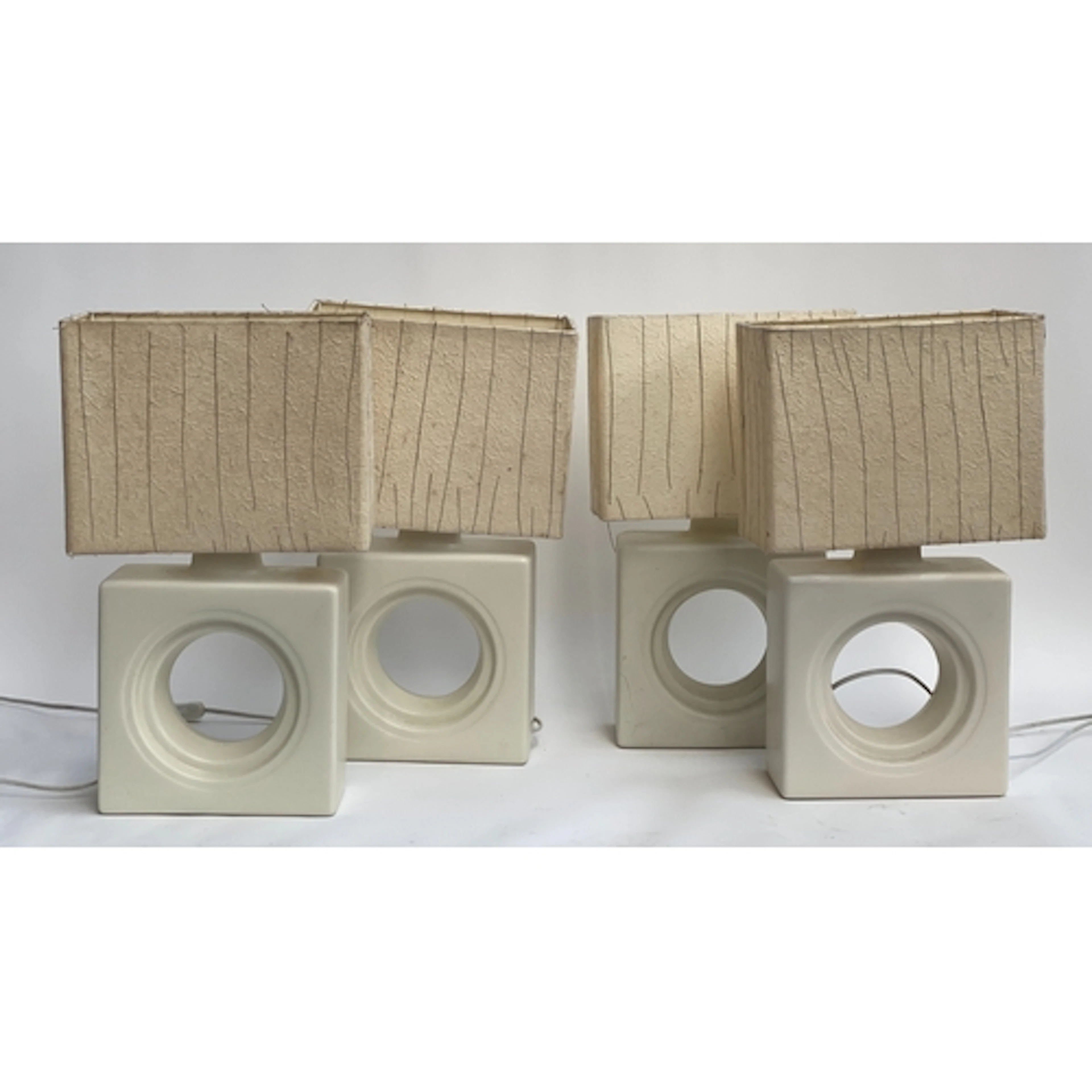 A set of four Ikea Lovart table lamps, 26cmH to base of fitt...