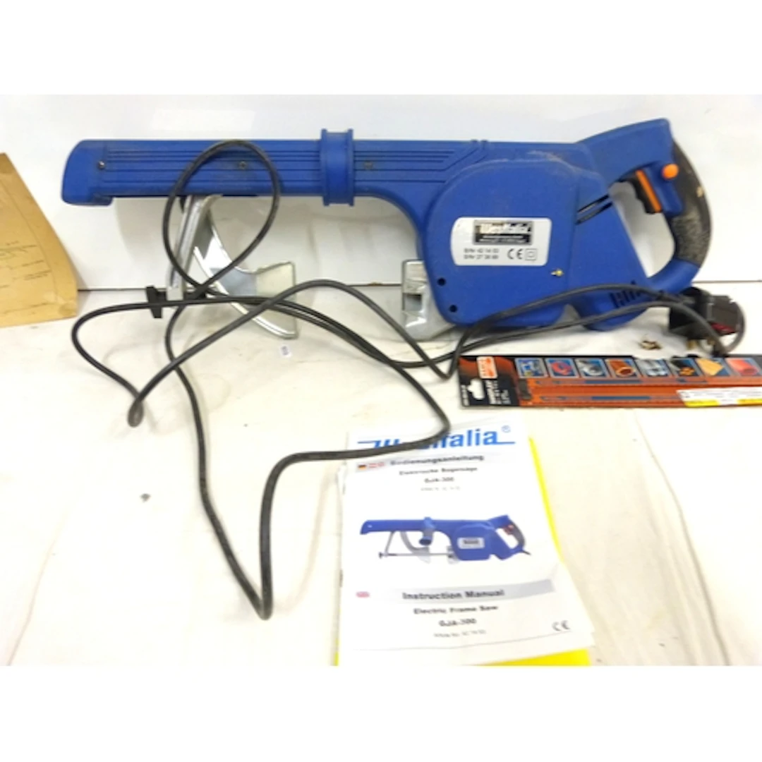 Westfalia electric frame saw in box.