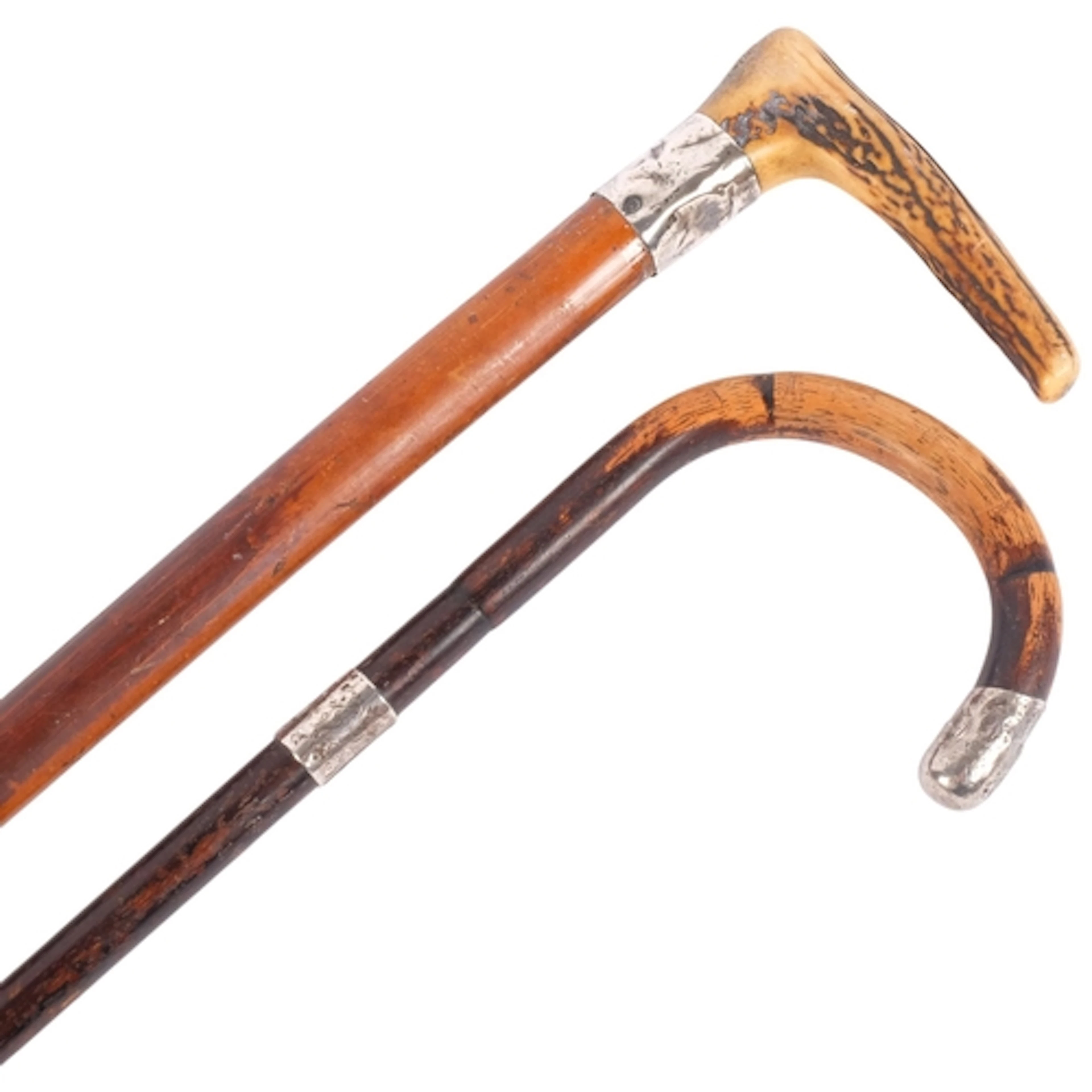 2 Antique walking canes, each with silver mounts, tallest 77...
