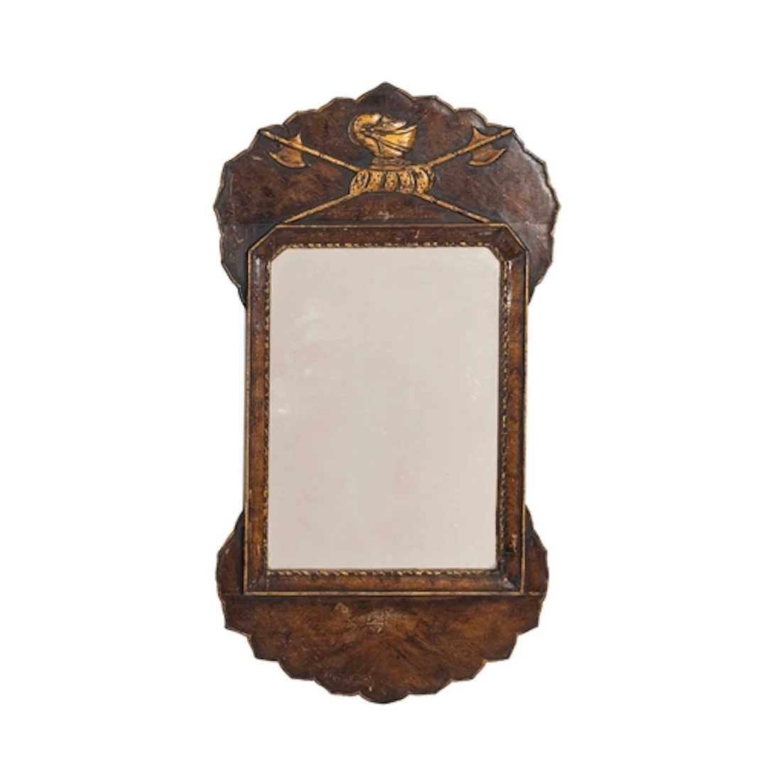A stained and parcel-giltwood framed wall mirror in George I...
