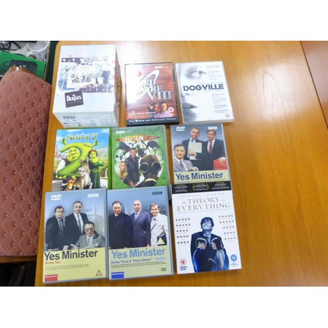 Two boxes of mixed CDs and DVDs to include The Beatles Antho...