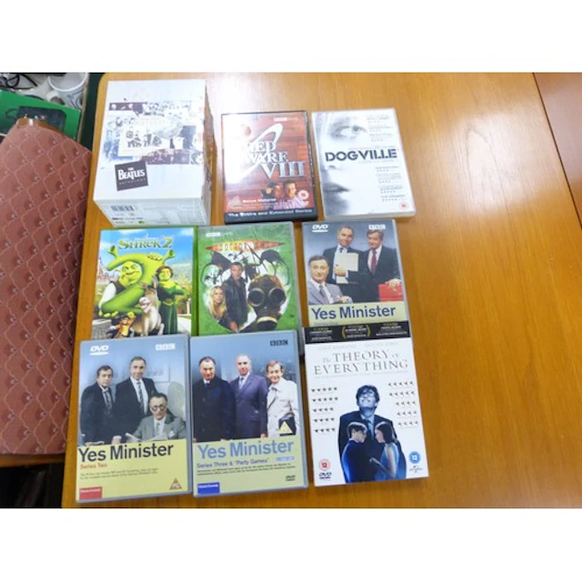 Two boxes of mixed CDs and DVDs to include The Beatles Antho...
