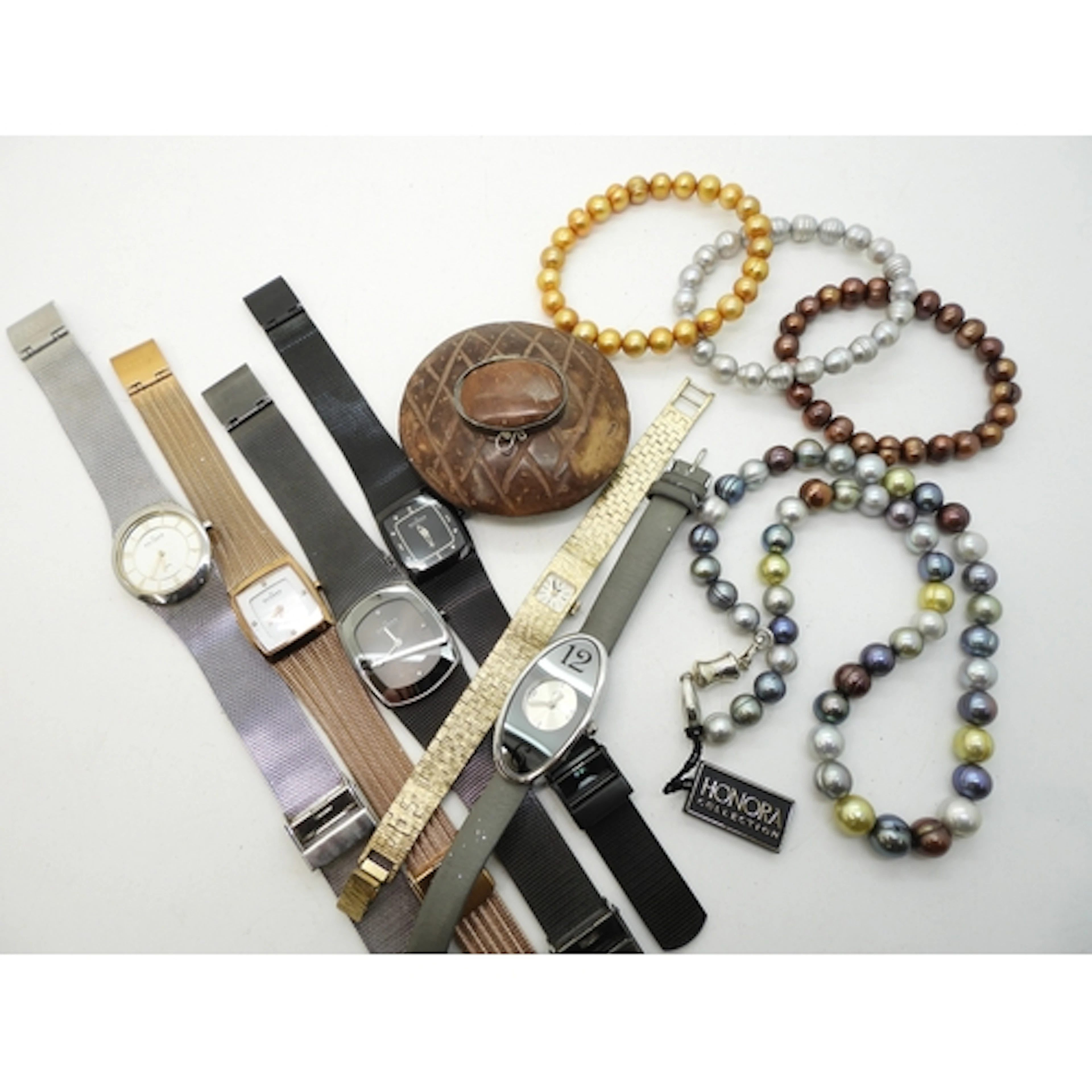 Four Danish Skagen watches, a multicolour cultured pearl nec...