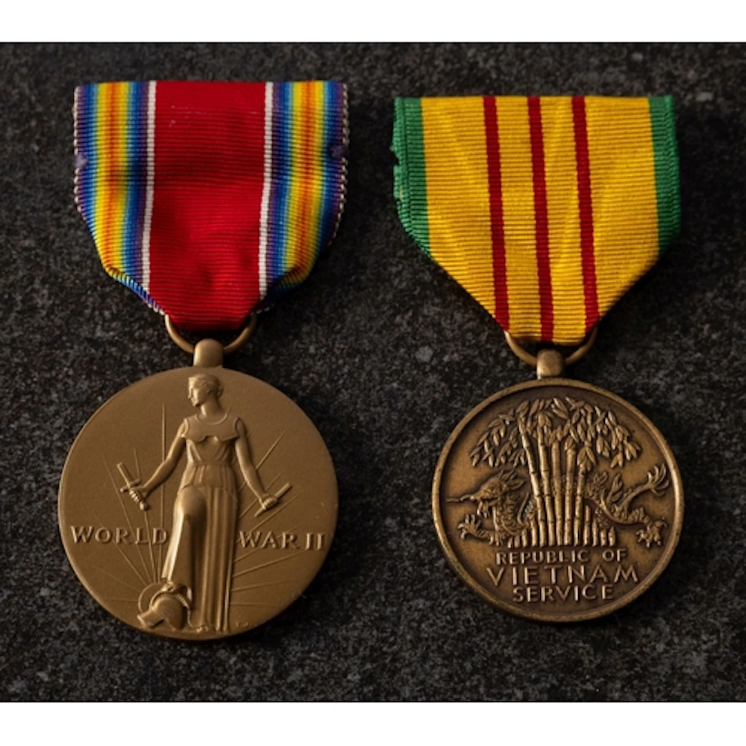 Four WWII era medals. Comprising an Atlantic Star, War Medal...