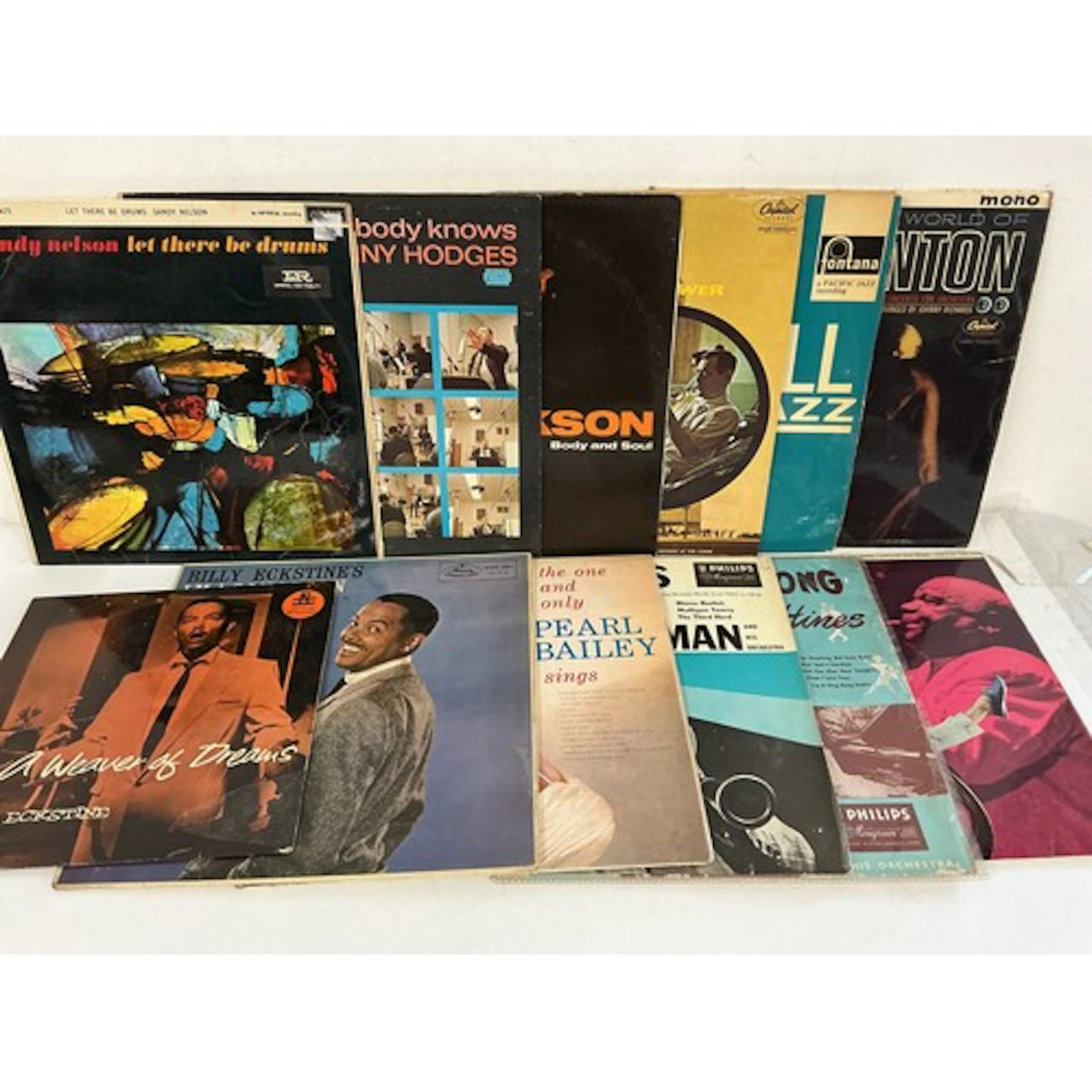 A collection of jazz LPs by various artists including Stan K...