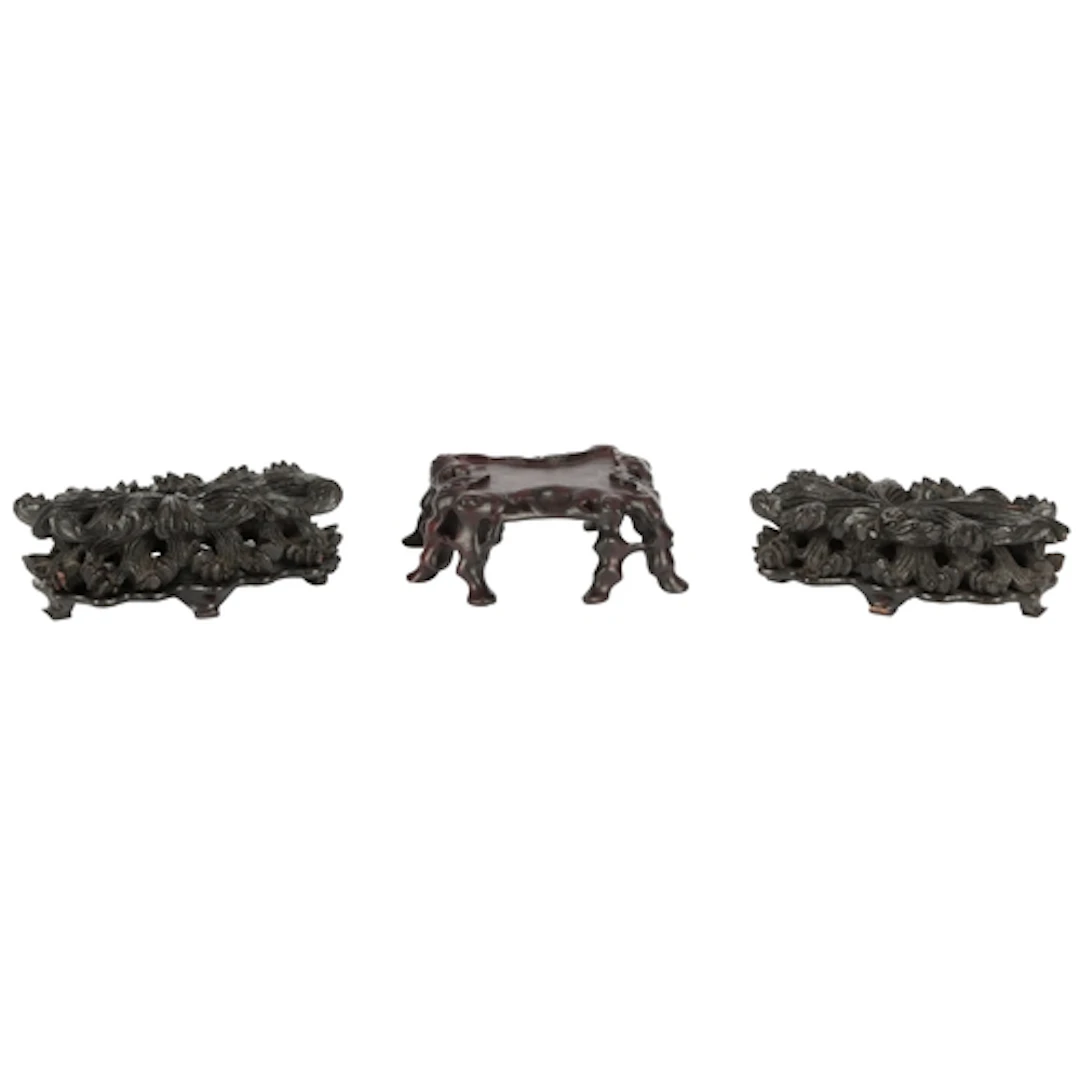 Three Chinese hardwood stands, late Qing dynasty, the near p...