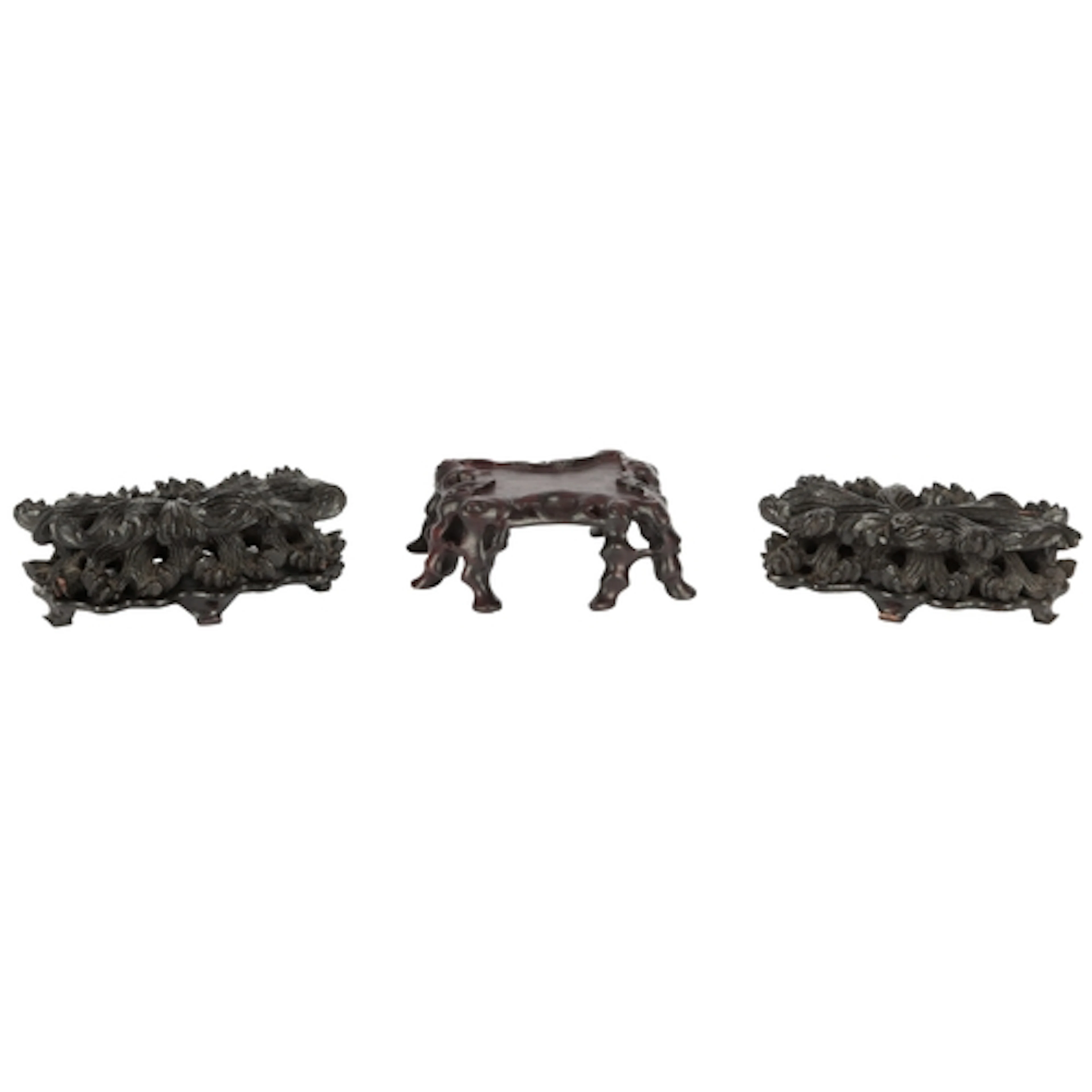 Three Chinese hardwood stands, late Qing dynasty, the near p...