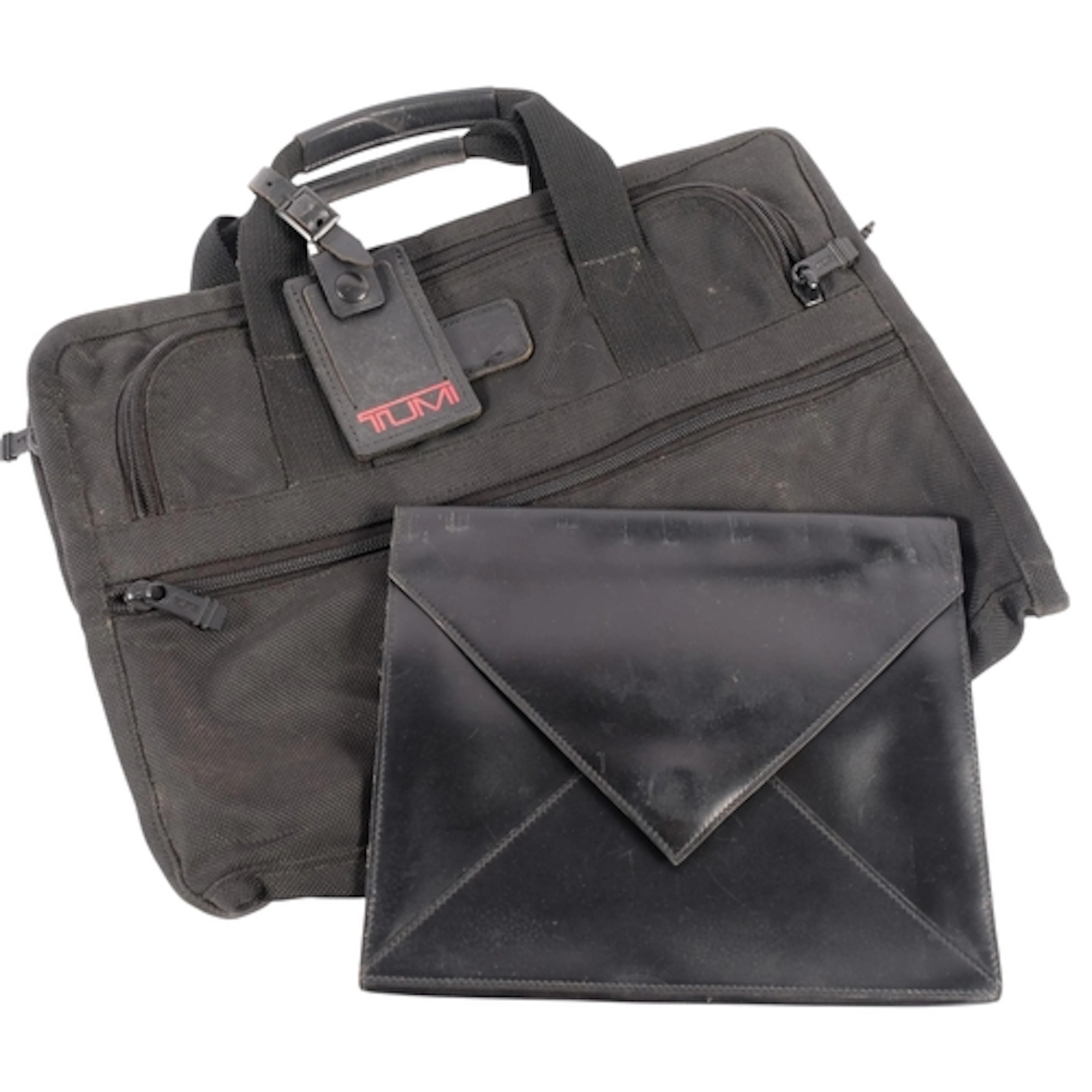 A Hermes black leather envelope style bag, W24.5cm, and a Tu...