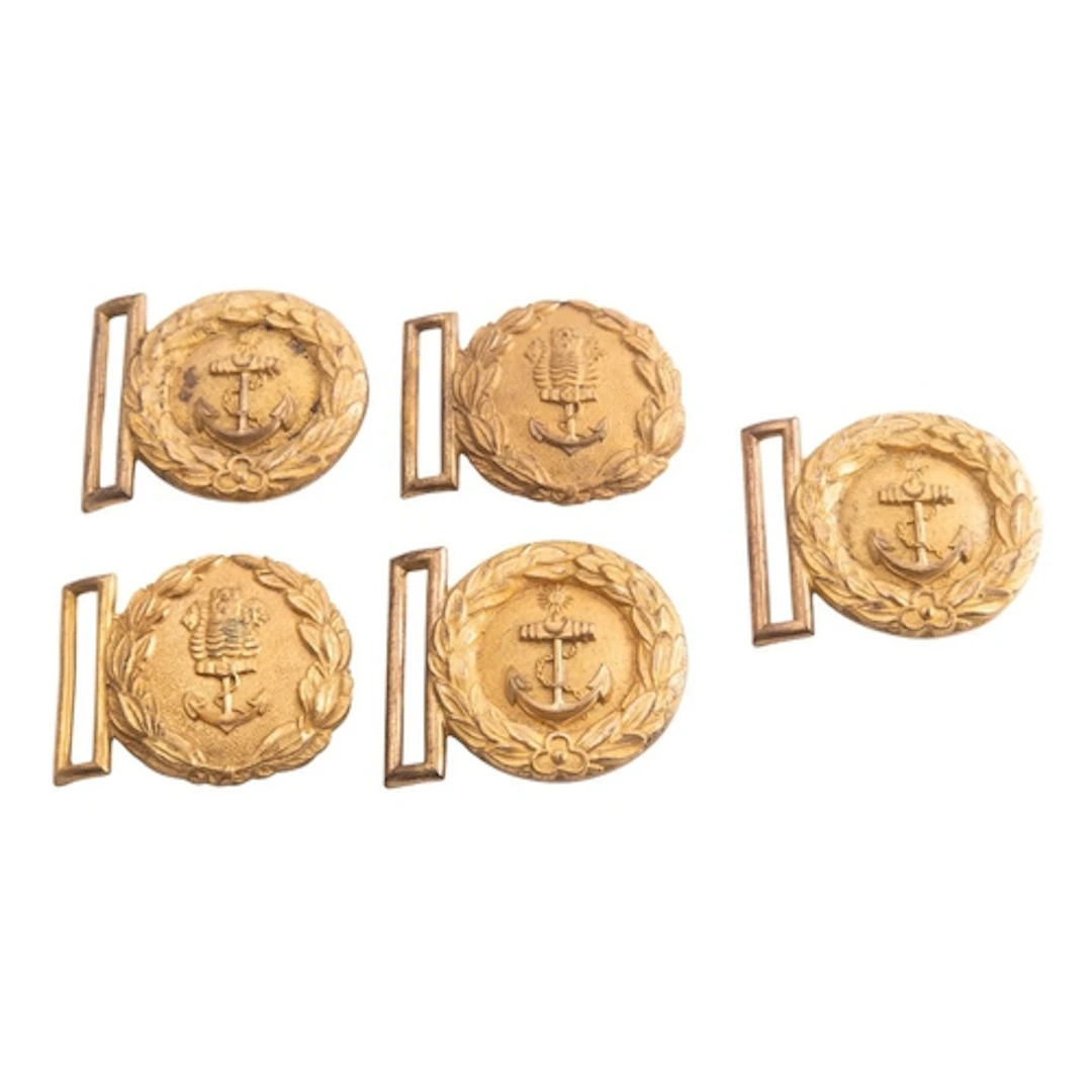 Two Indian Navy gilt brass belt buckles, together with three...