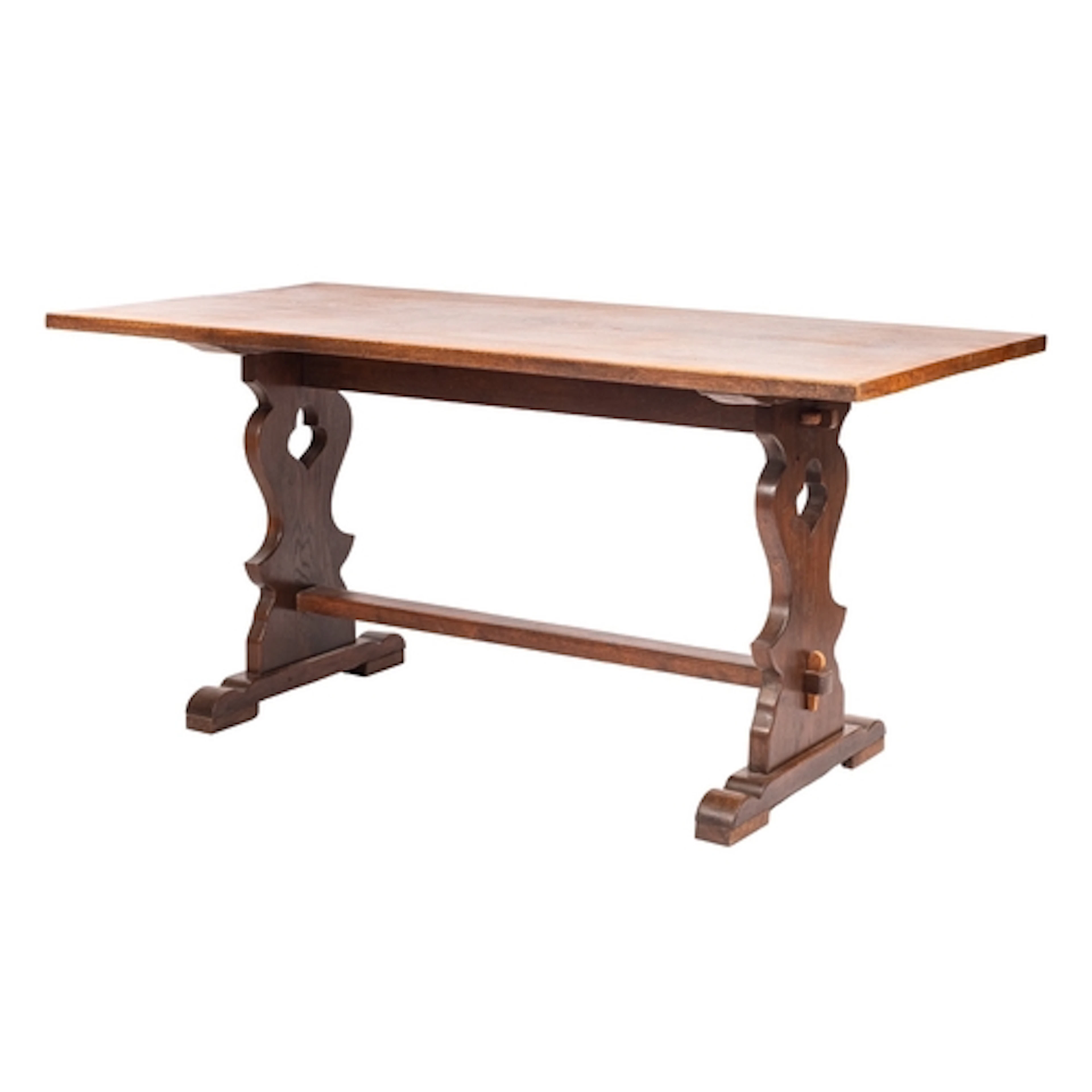 An oak trestle dining table, early 20th century and adapted;...