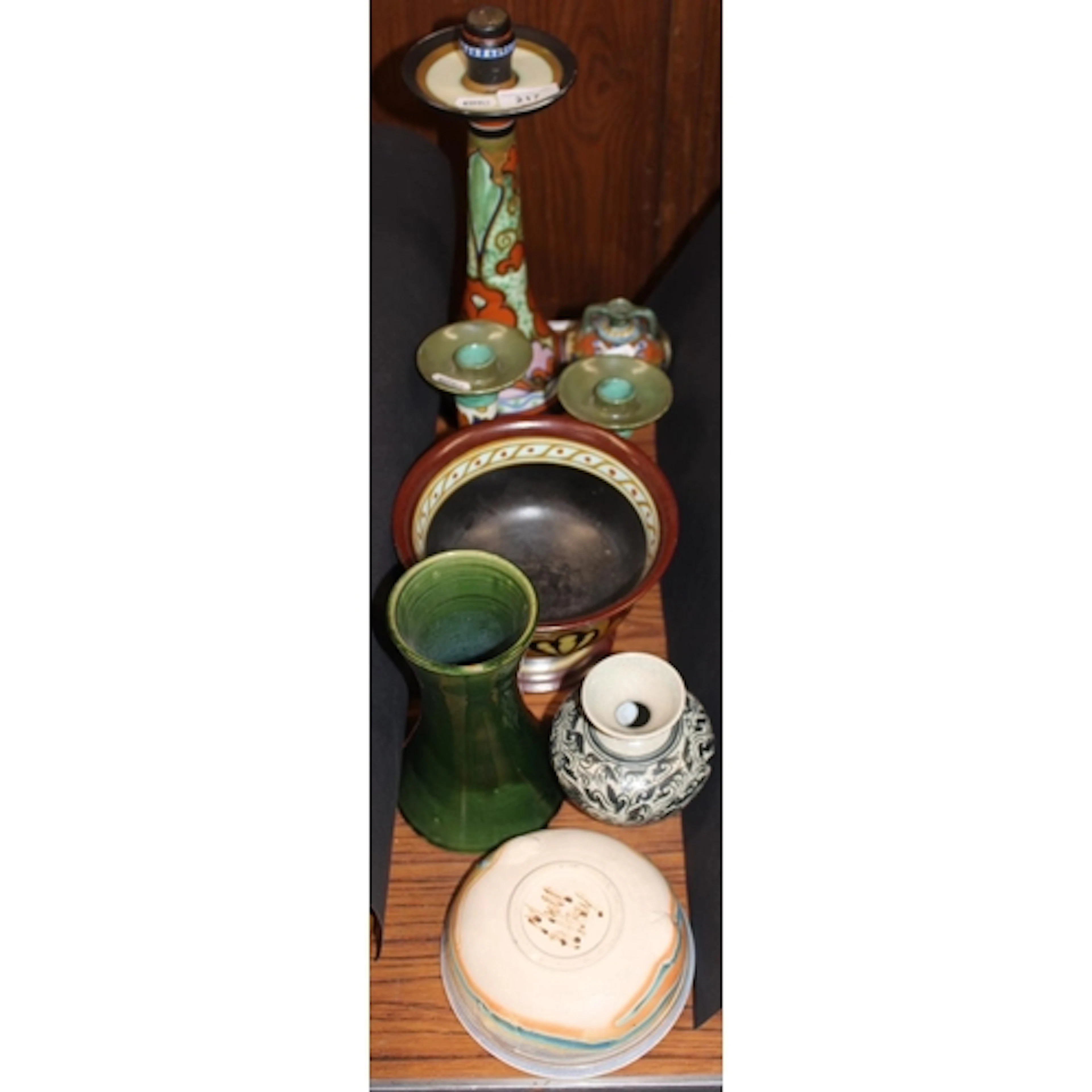 Gouda of Holland pottery candlestick, three similar pieces, ...