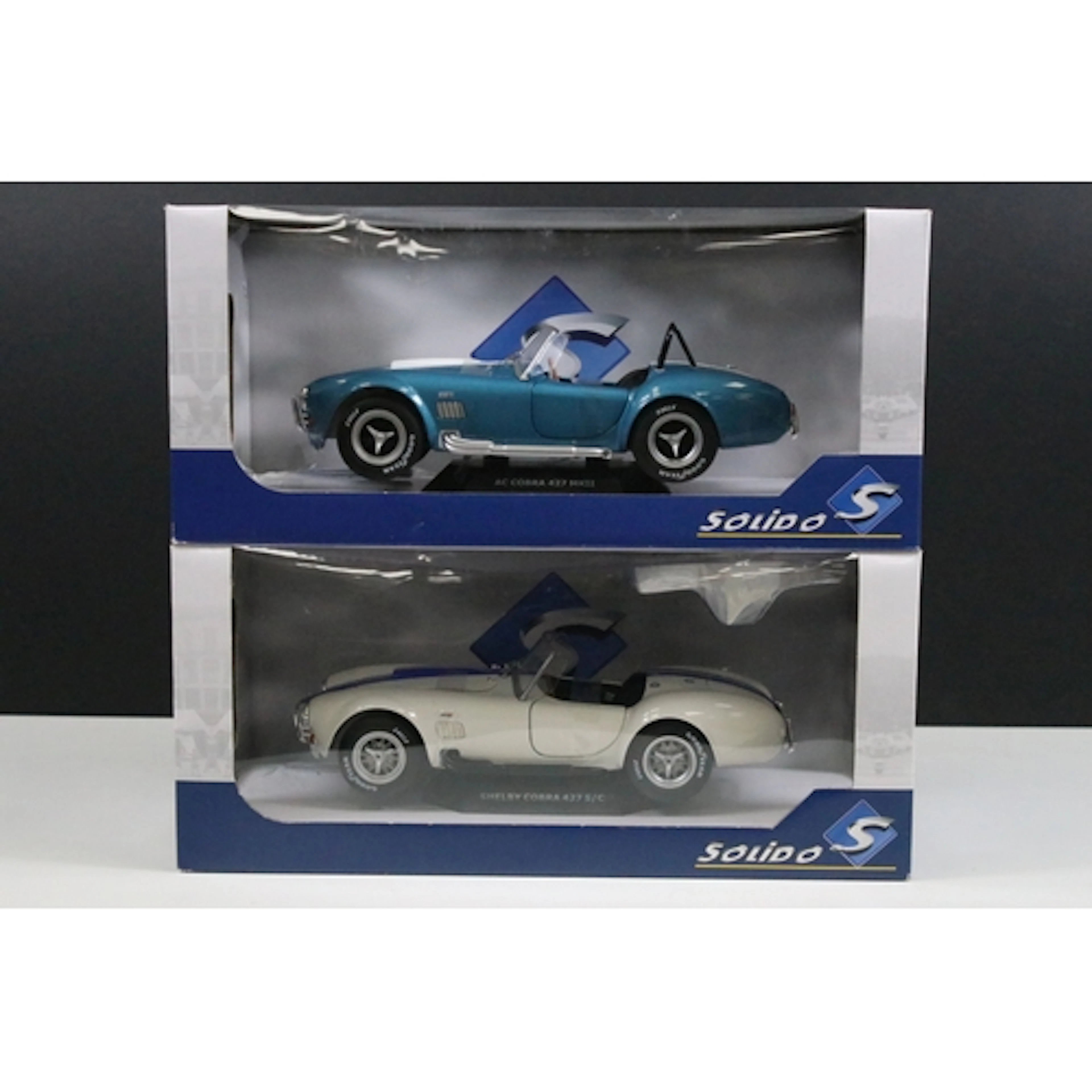 Two boxed Solido 1/18 diecast models to include Shelby Cobra...