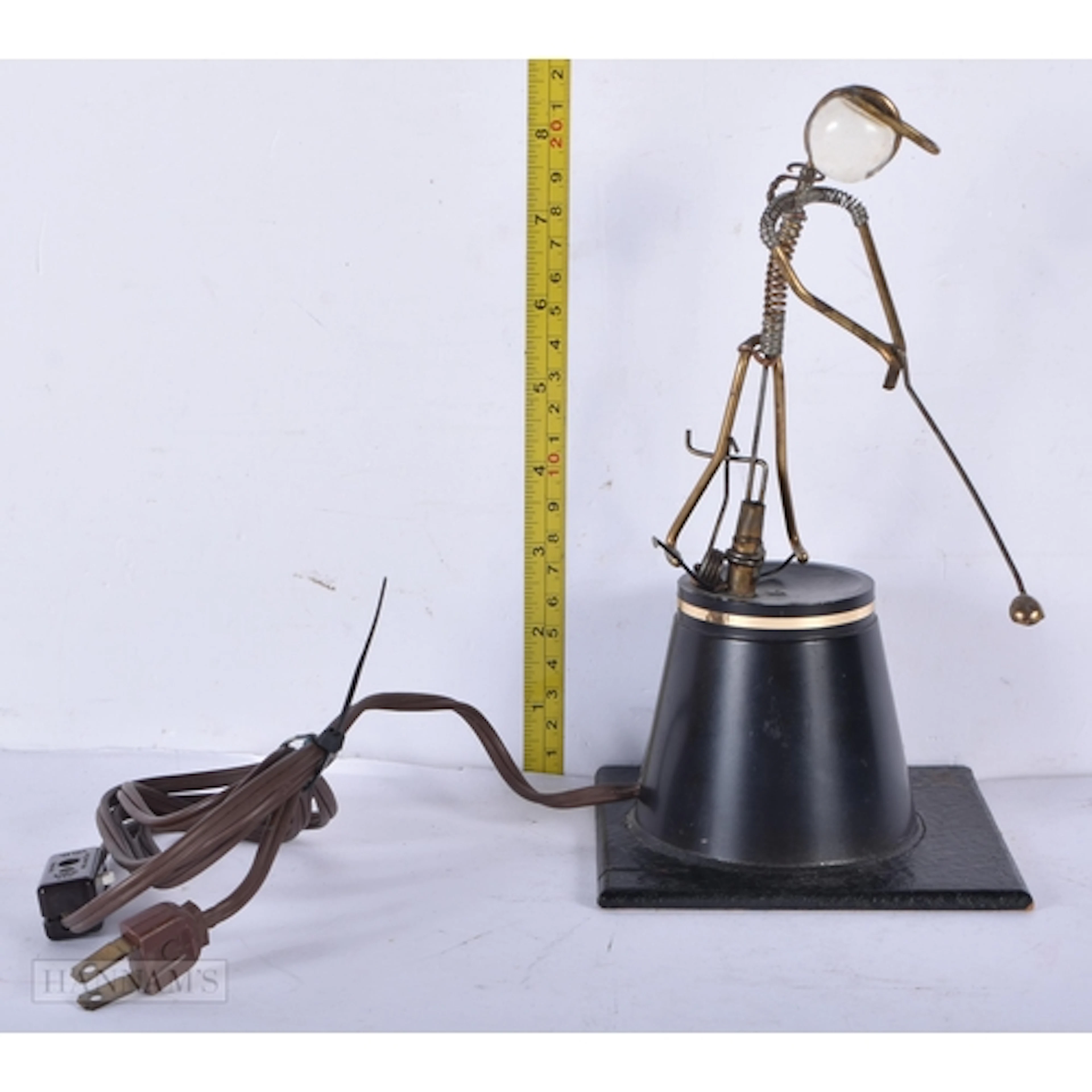 A vintage electric kinetic sculpture "The Golfer" by George ...