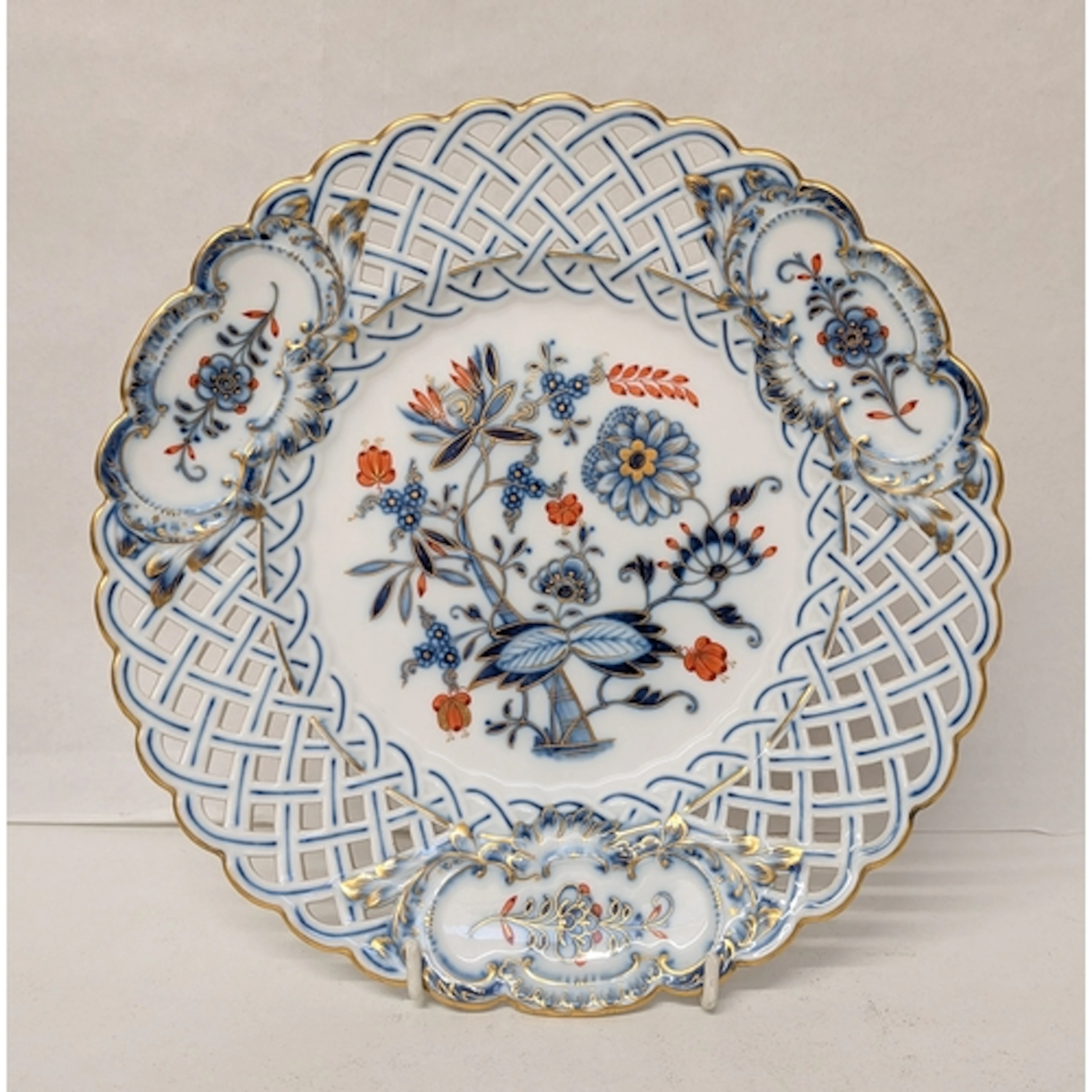 A Meissen blue white iron red and gilt ribbon cabinet plate,...