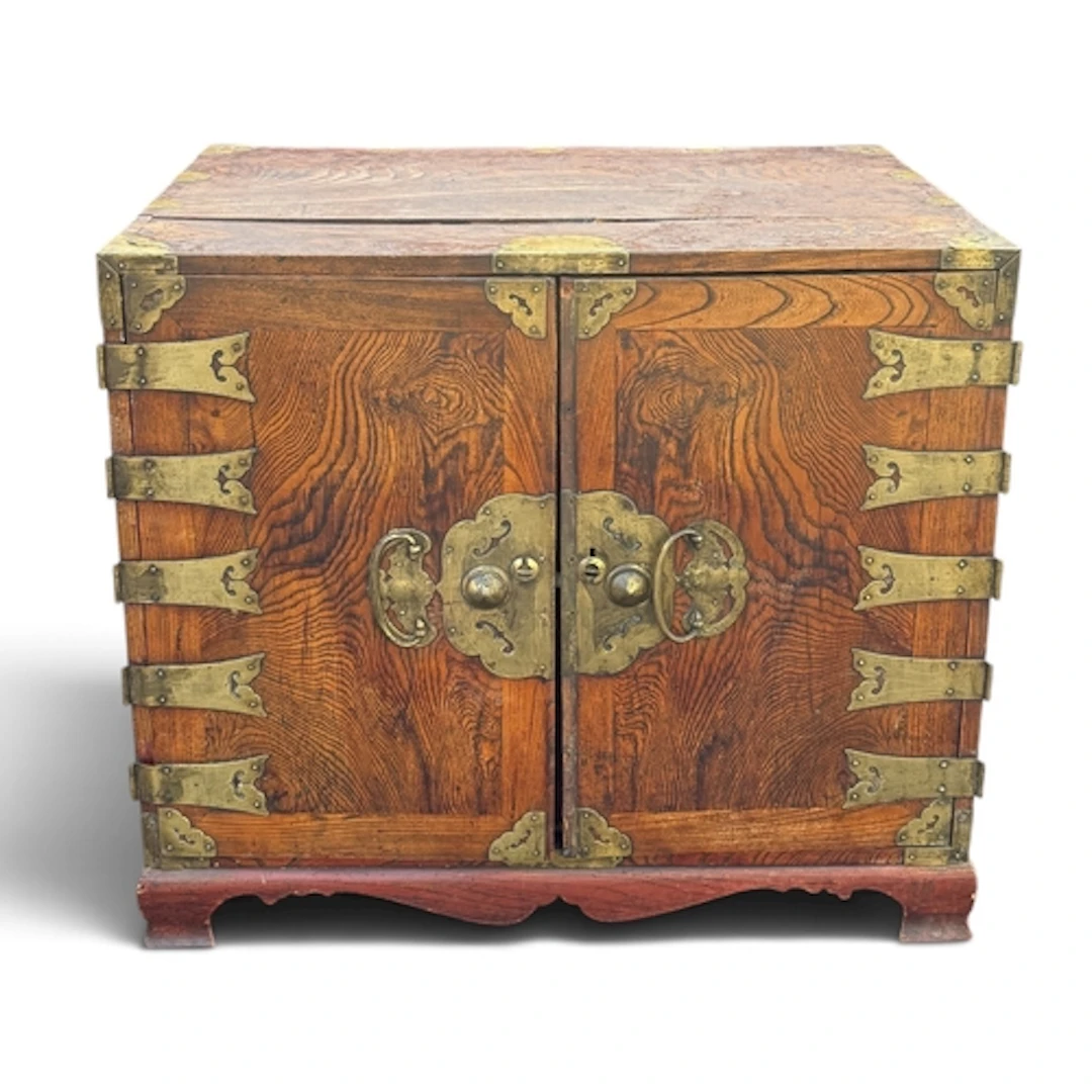 A 19TH CENTURY KOREAN CHEST OF DRAWERS With brass mounts and...