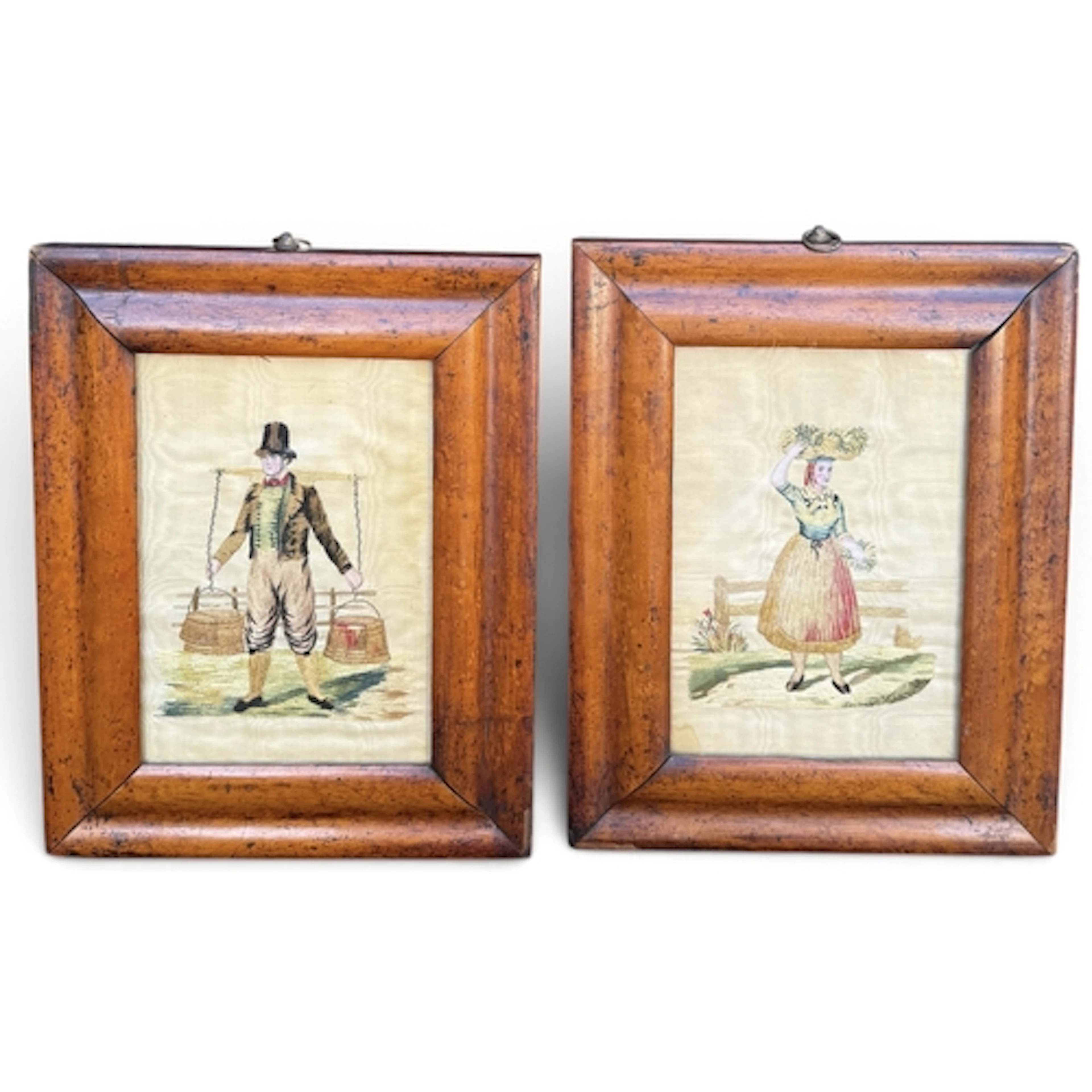 A PAIR OF EARLY 19TH CENTURY WOOLWORK EMBROIDERIES Depicting...