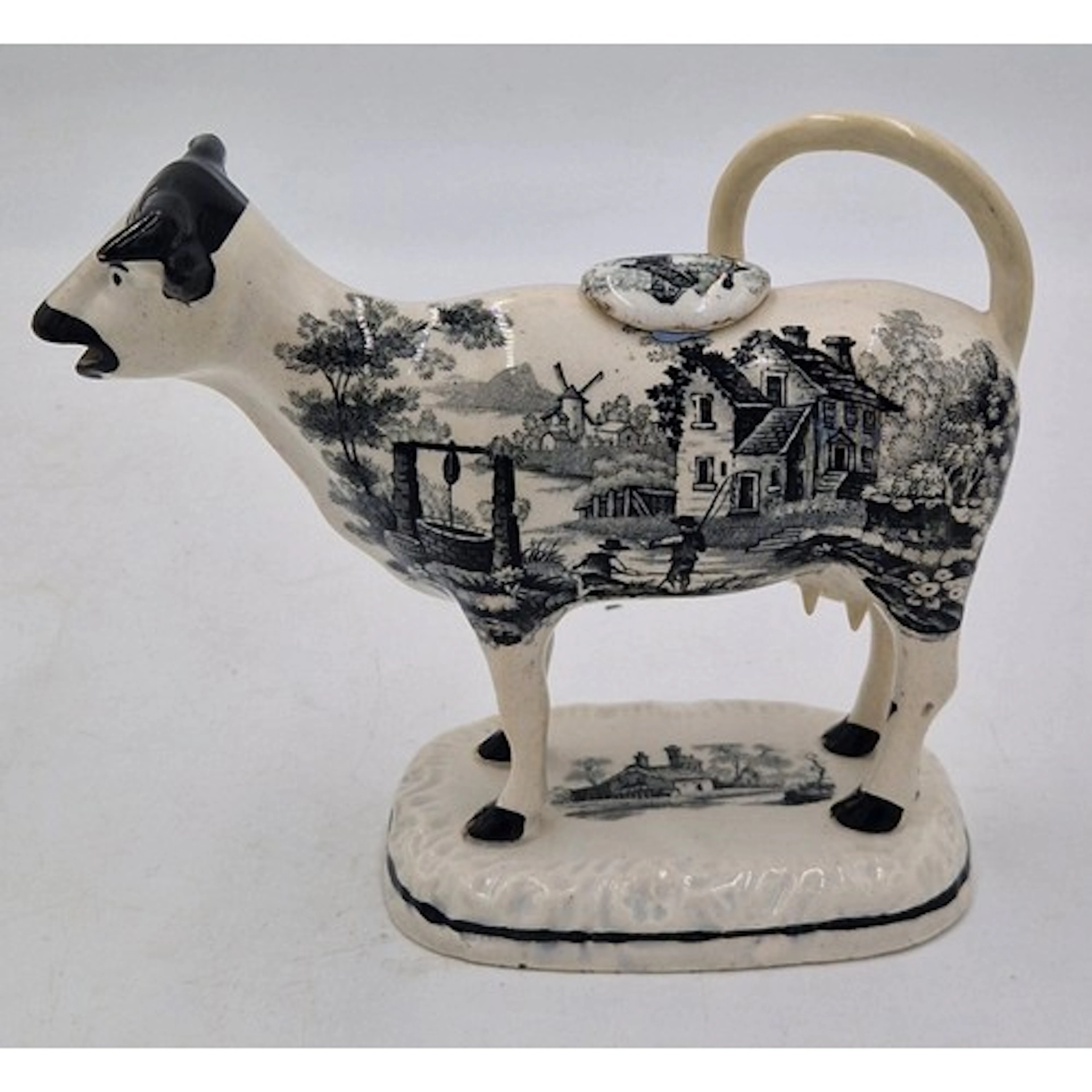 An early 19th century black and white transfer printed Swans...