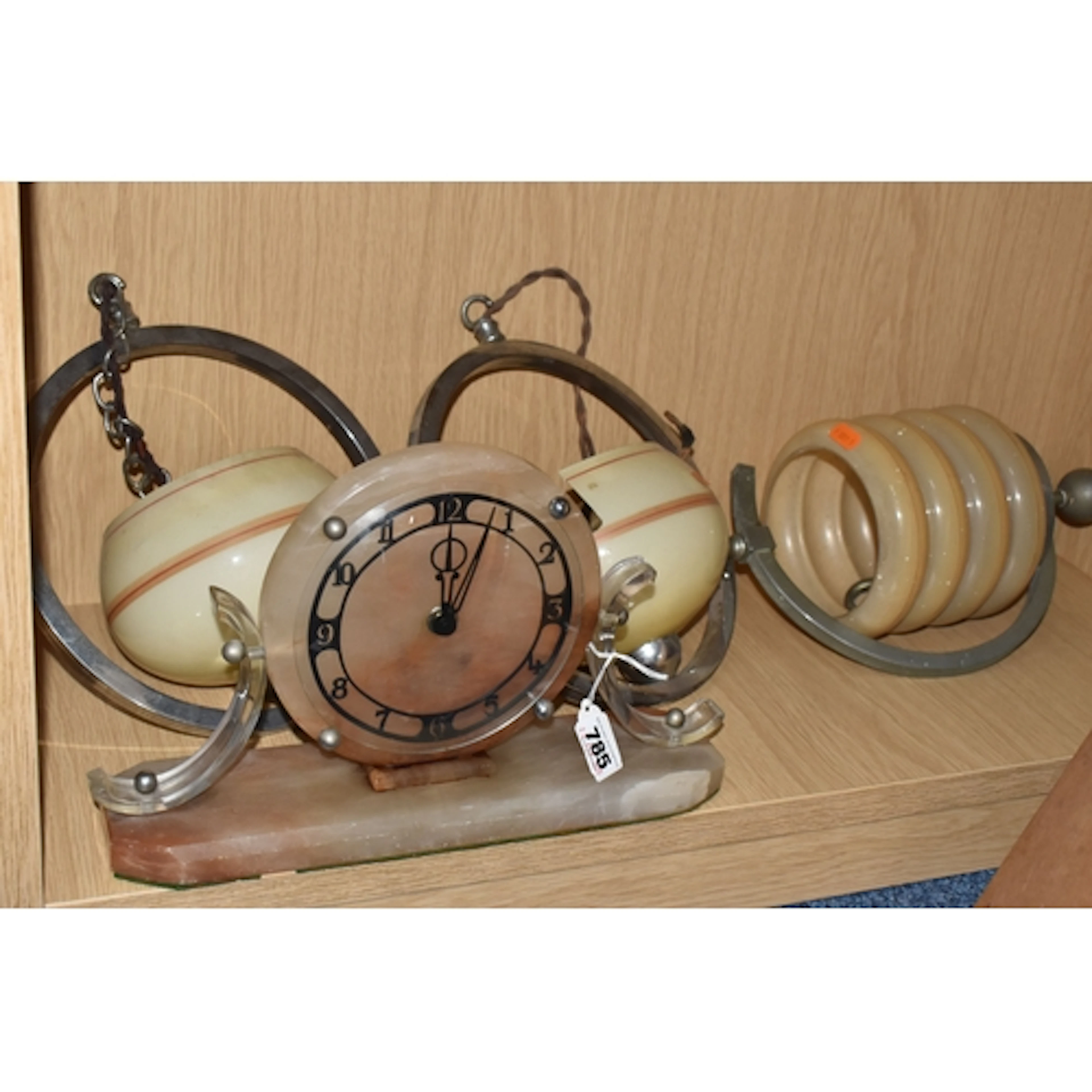 A GROUP OF VINTAGE LIGHT FURNISHINGS AND A CLOCK comprising ...