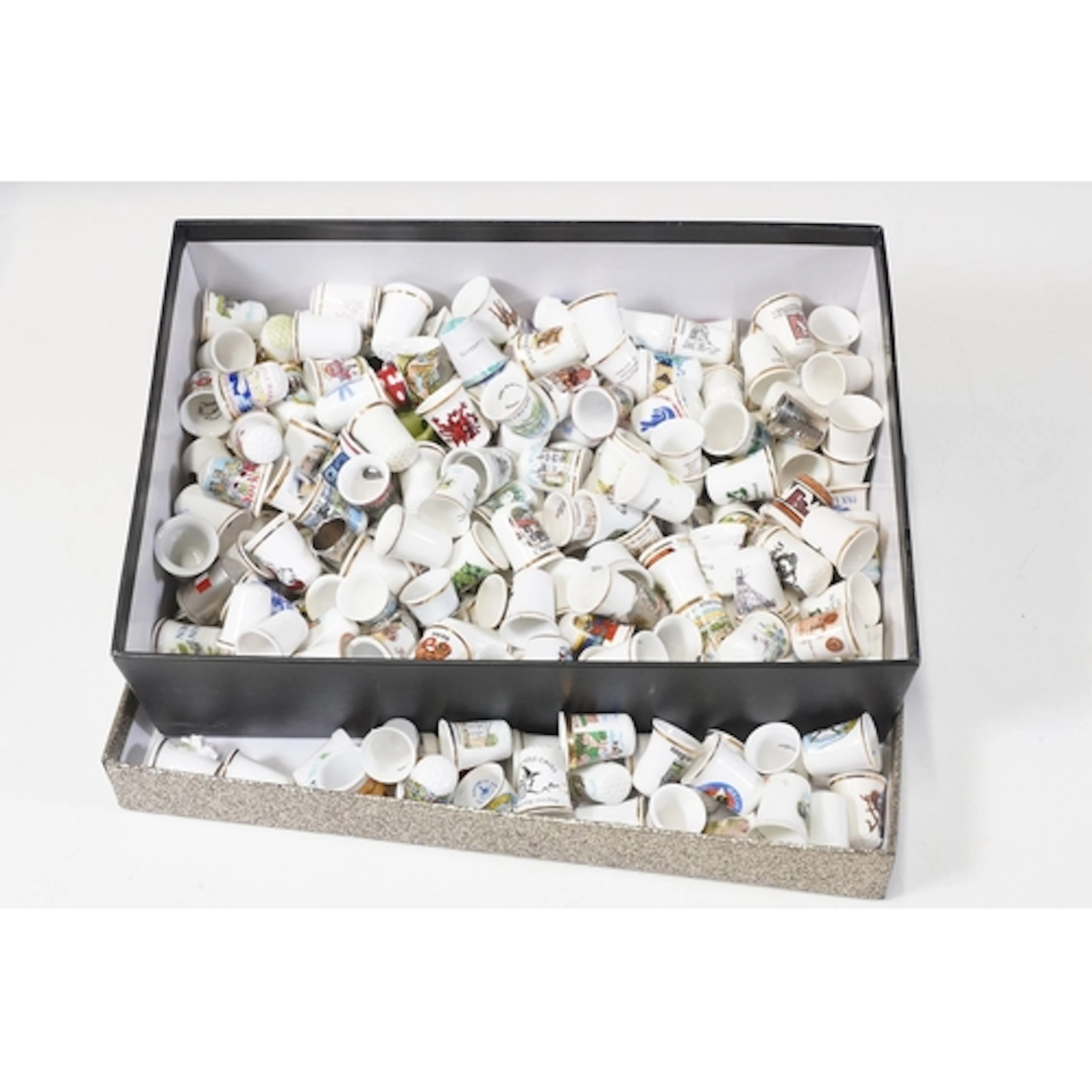 Large collection of bone china and metal thimbles by various...