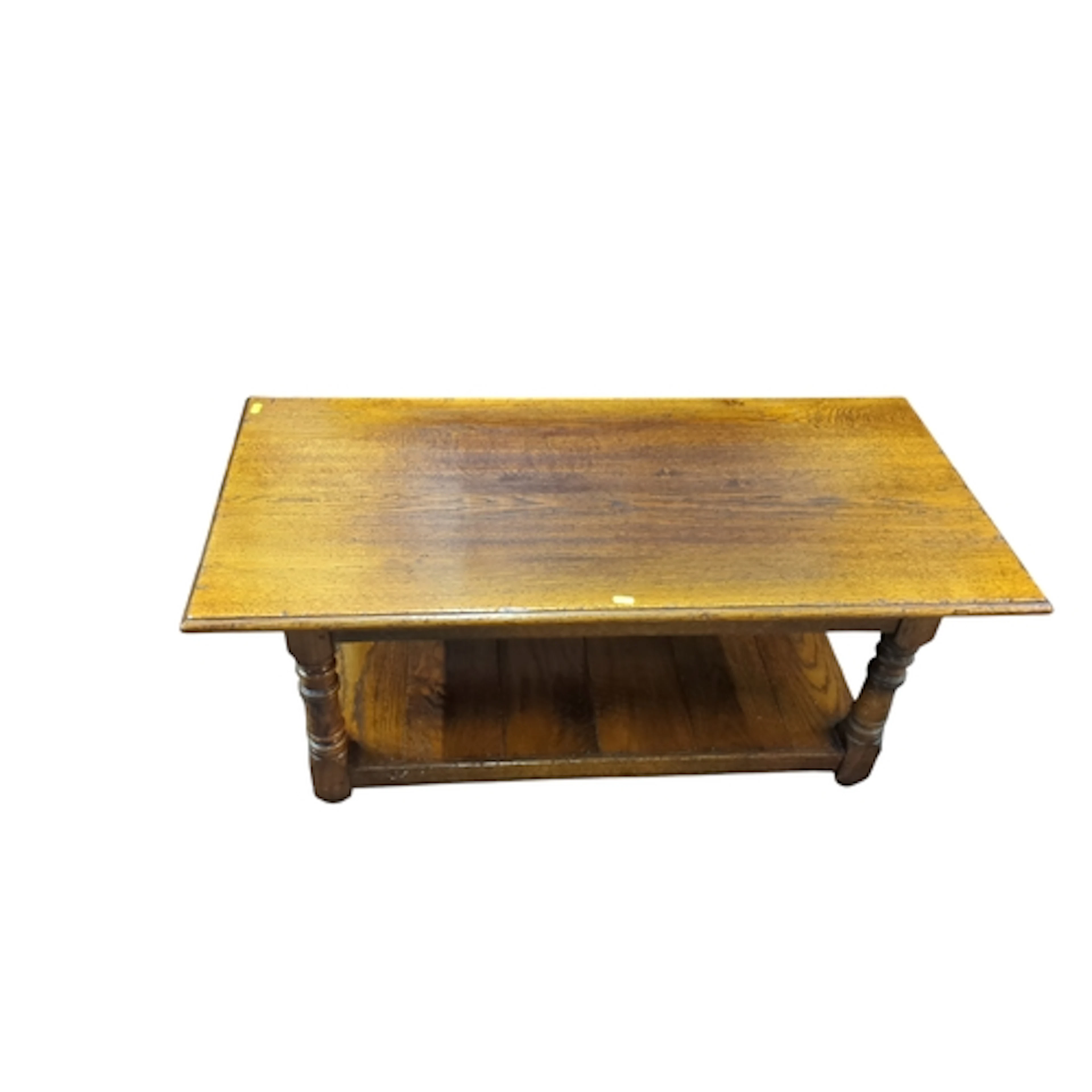 Oak coffee table of rectangular form, with a moulded top abo...