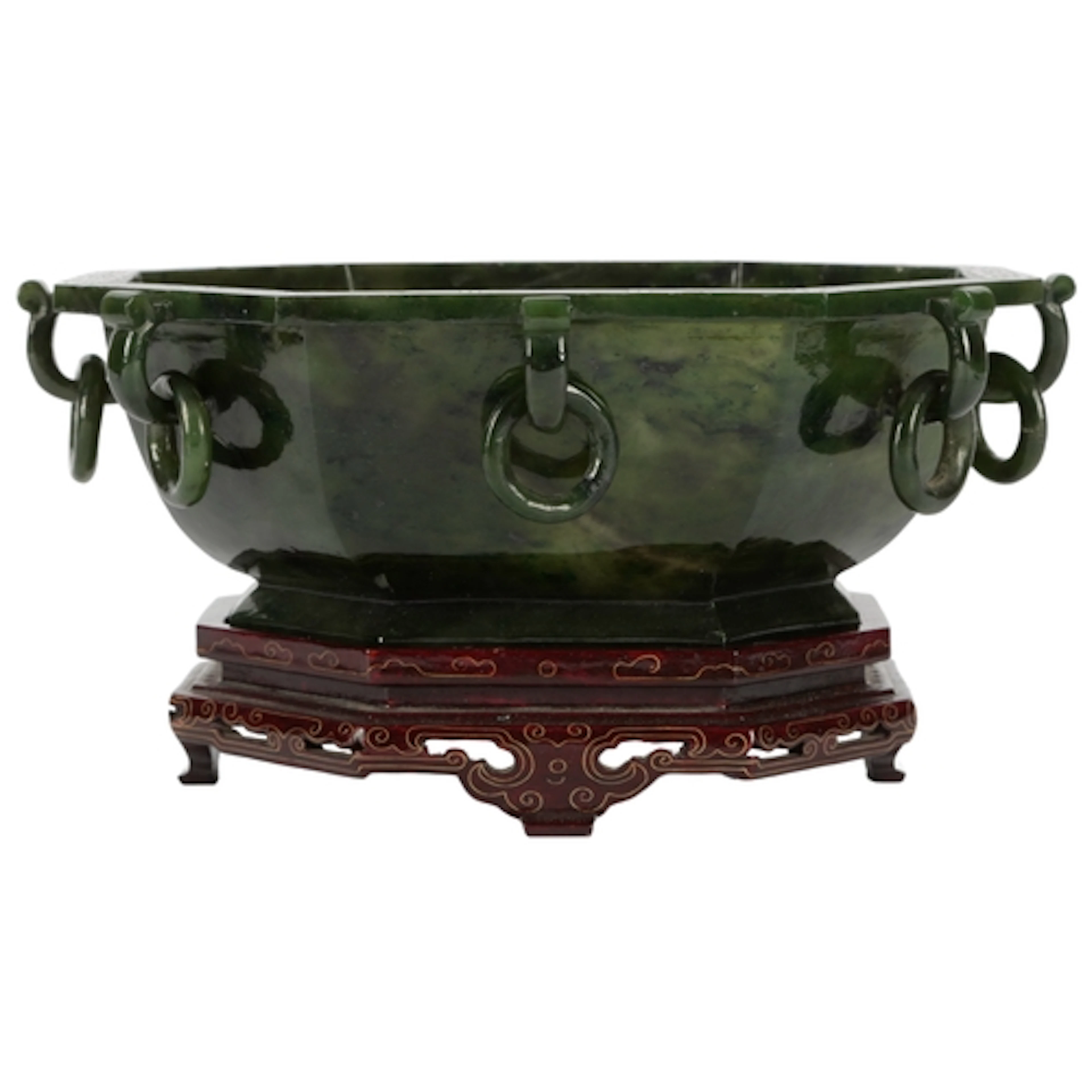 A large Chinese archaistic spinach green jade octagonal bowl...