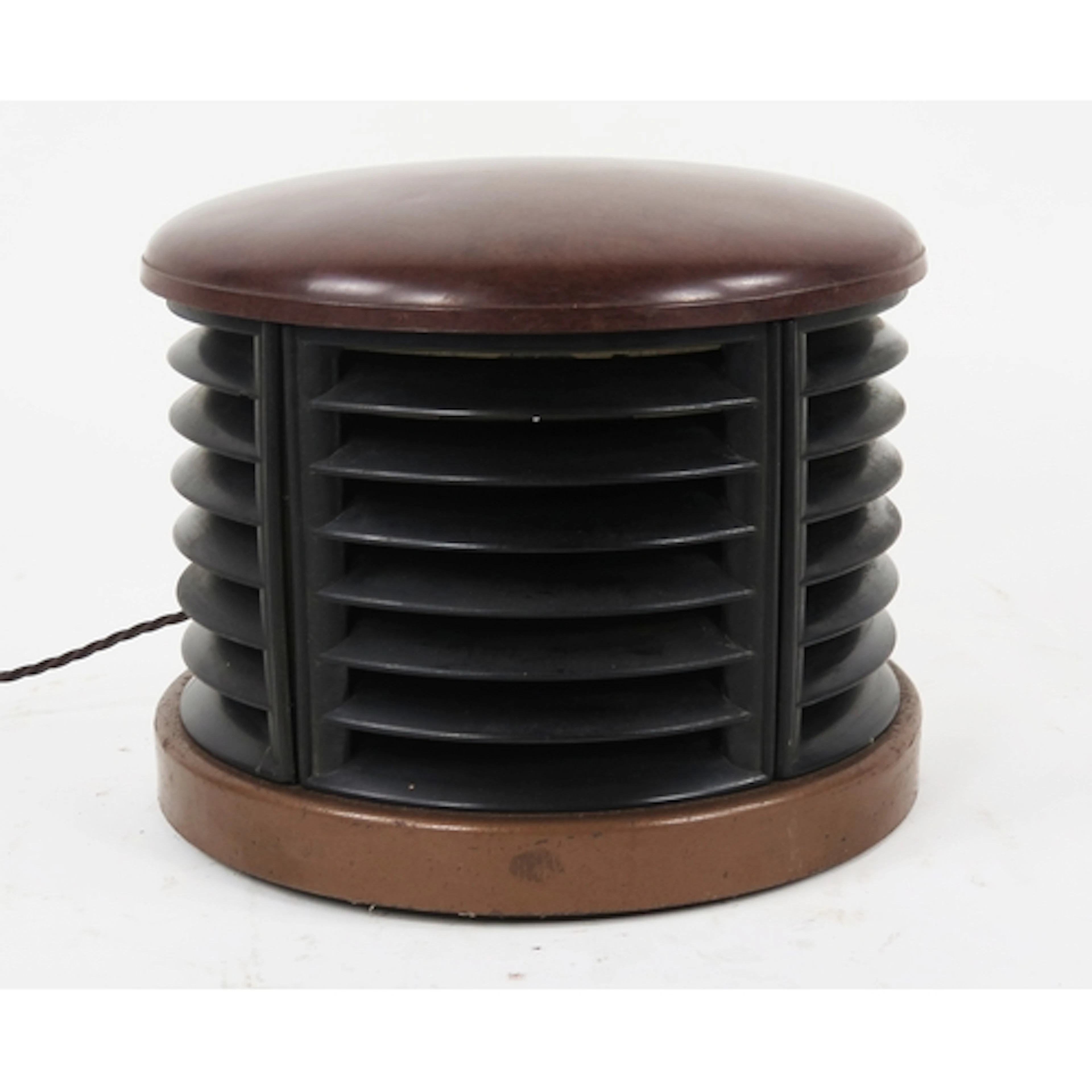 An Art Deco period Bakelite and metal fan, of bowed outline,...