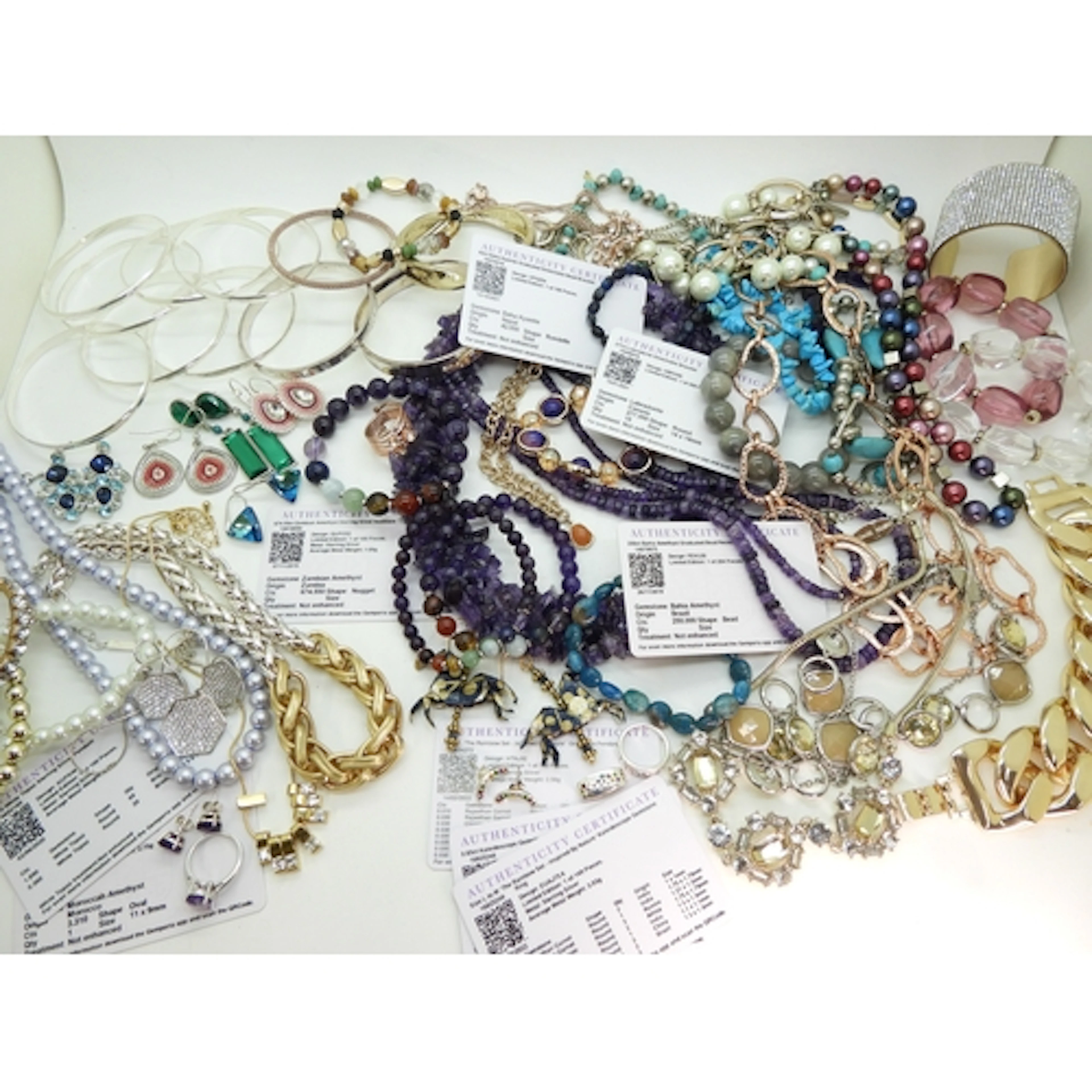 A large collection of silver gem set jewellery from Gemporia...
