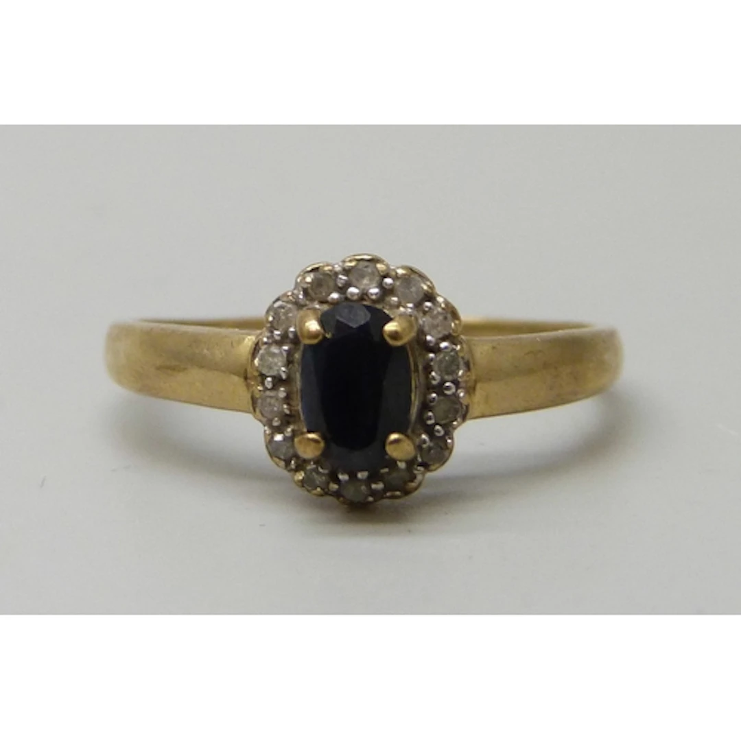 A 9ct gold, diamond and sapphire ring, 1.8g