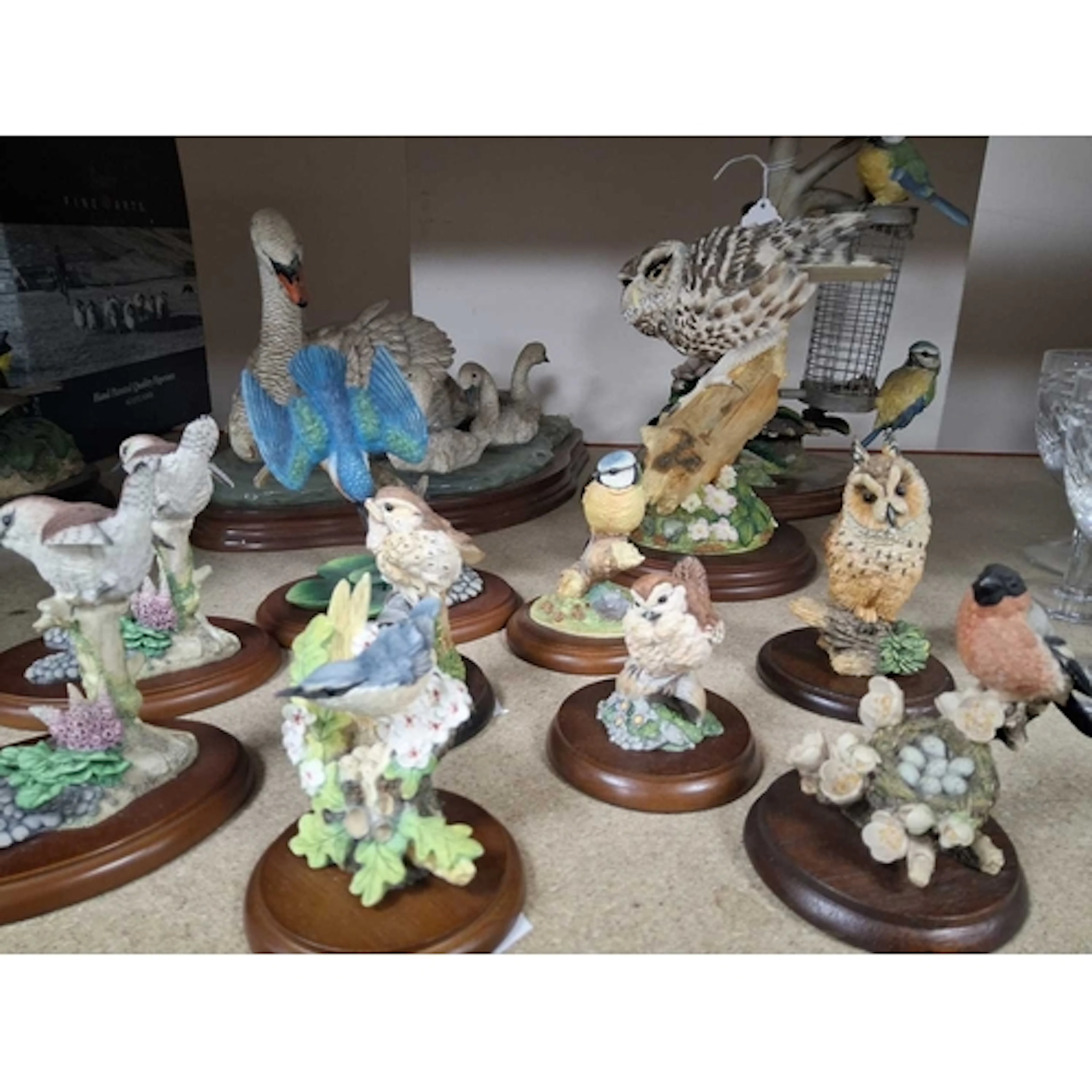 A GROUP OF BORDER FINE ARTS SCULPTURES BY RUSSELL WILLIS com...