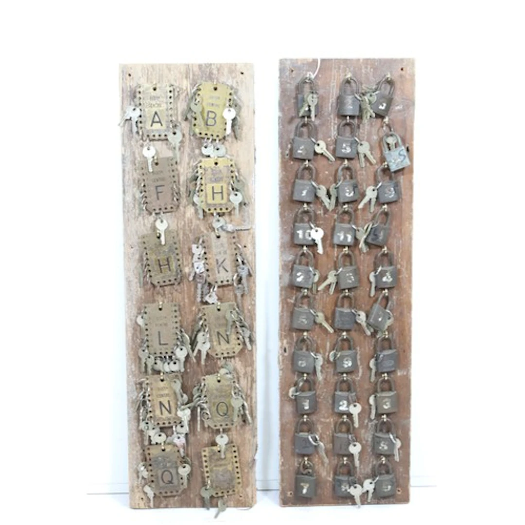 Two display boards of keys and padlocks, comprising one with...