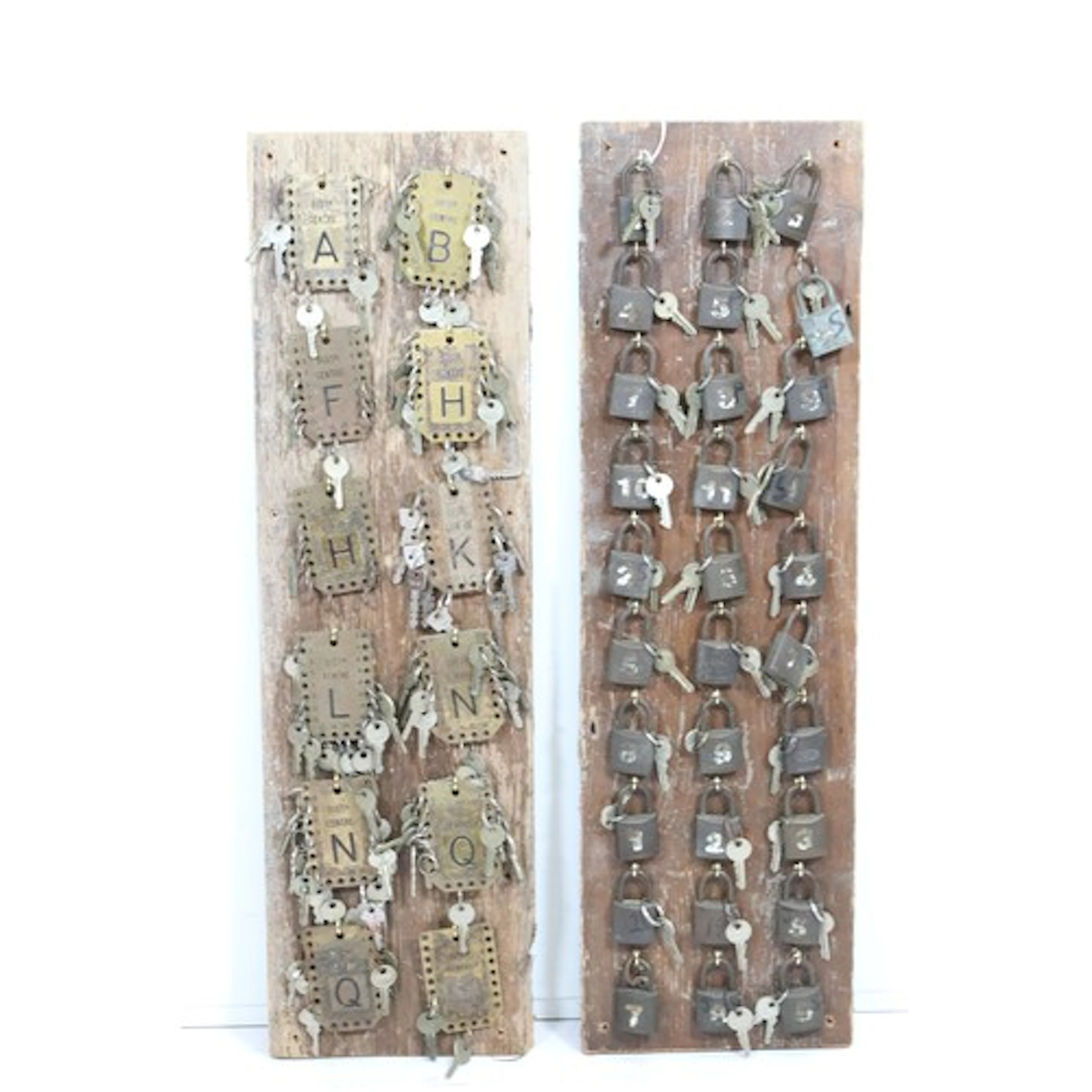 Two display boards of keys and padlocks, comprising one with...