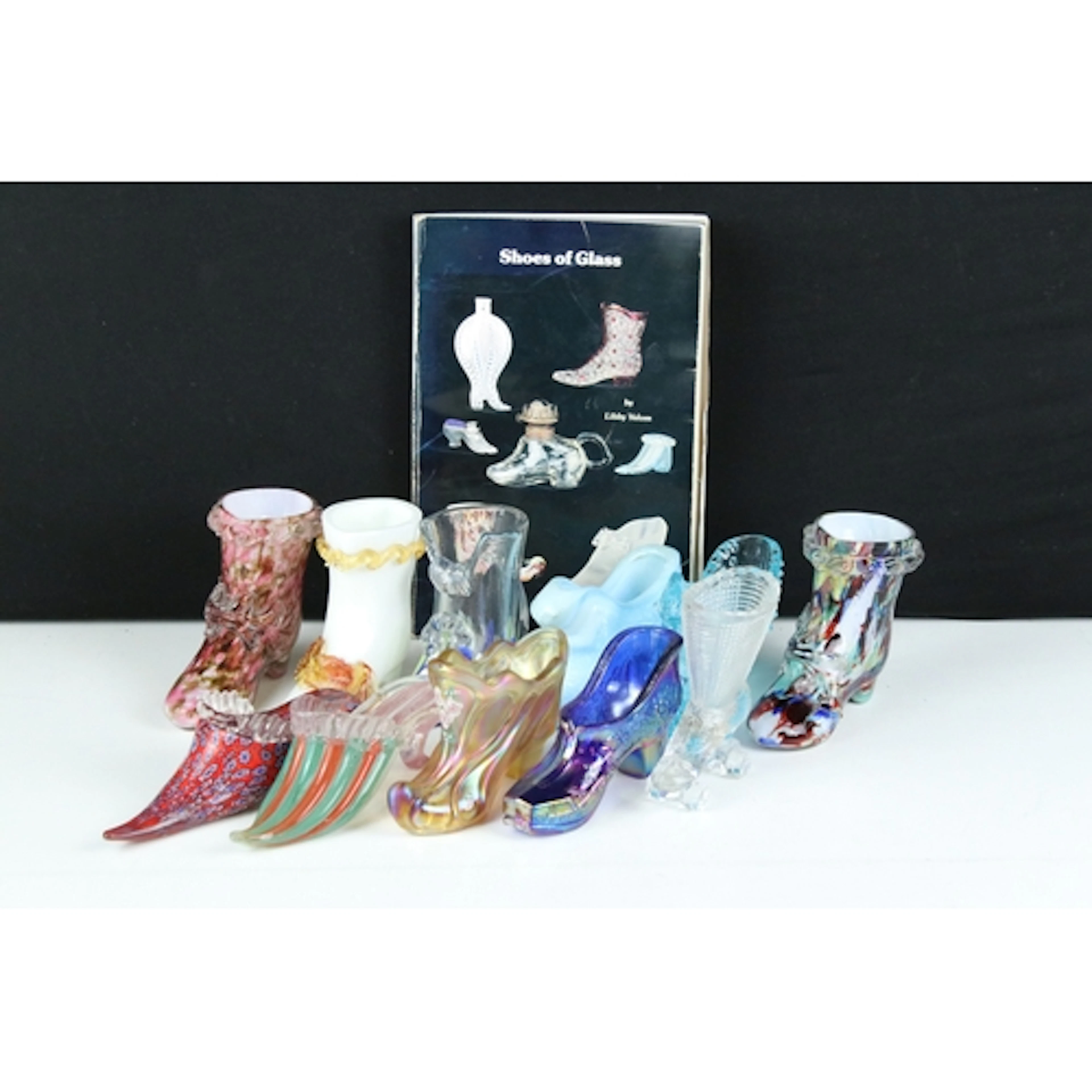 Eleven Victorian and later glass shoes to include a Westmore...