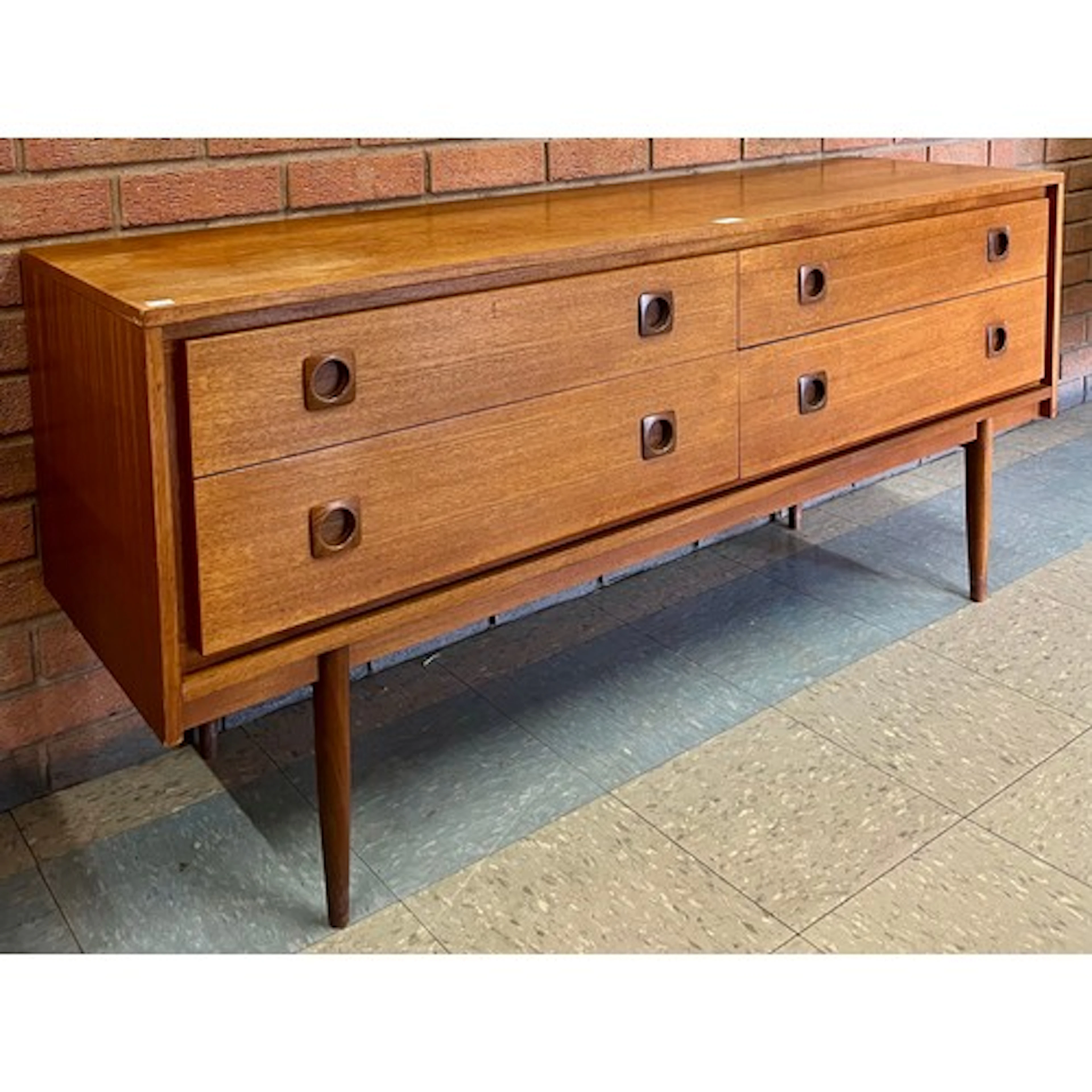 A Wrighton teak four drawer sideboard