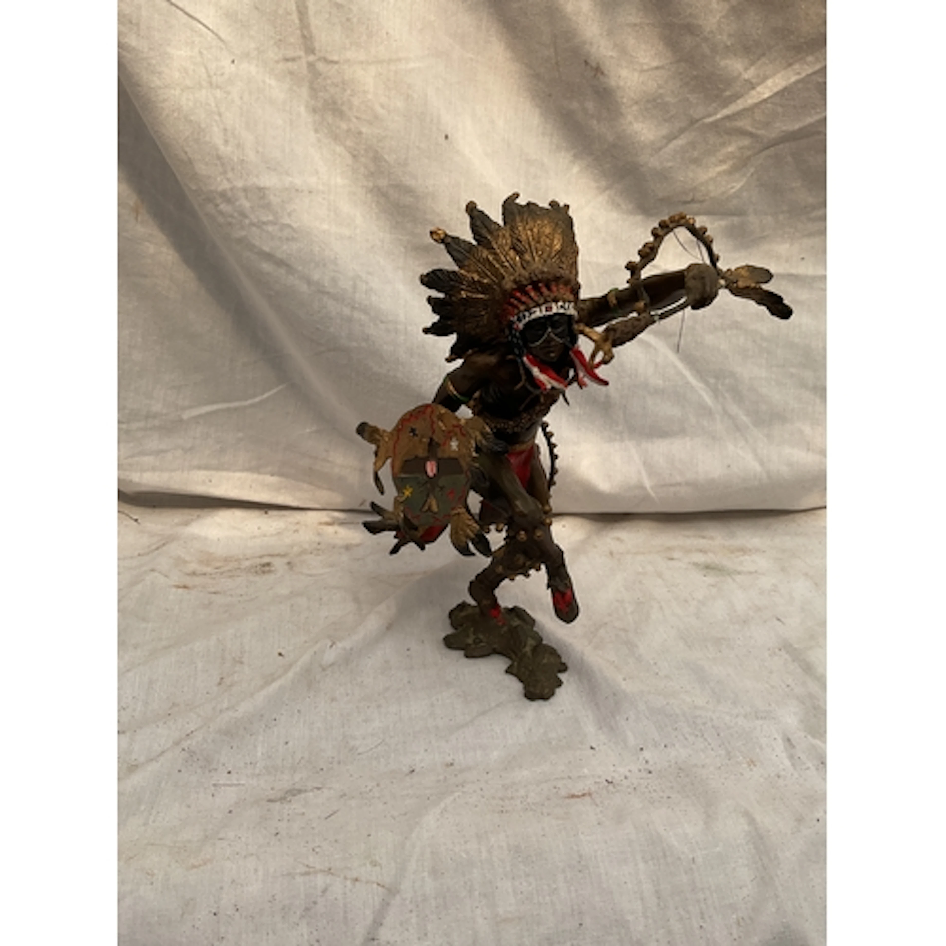 Painted bronze of a Native American