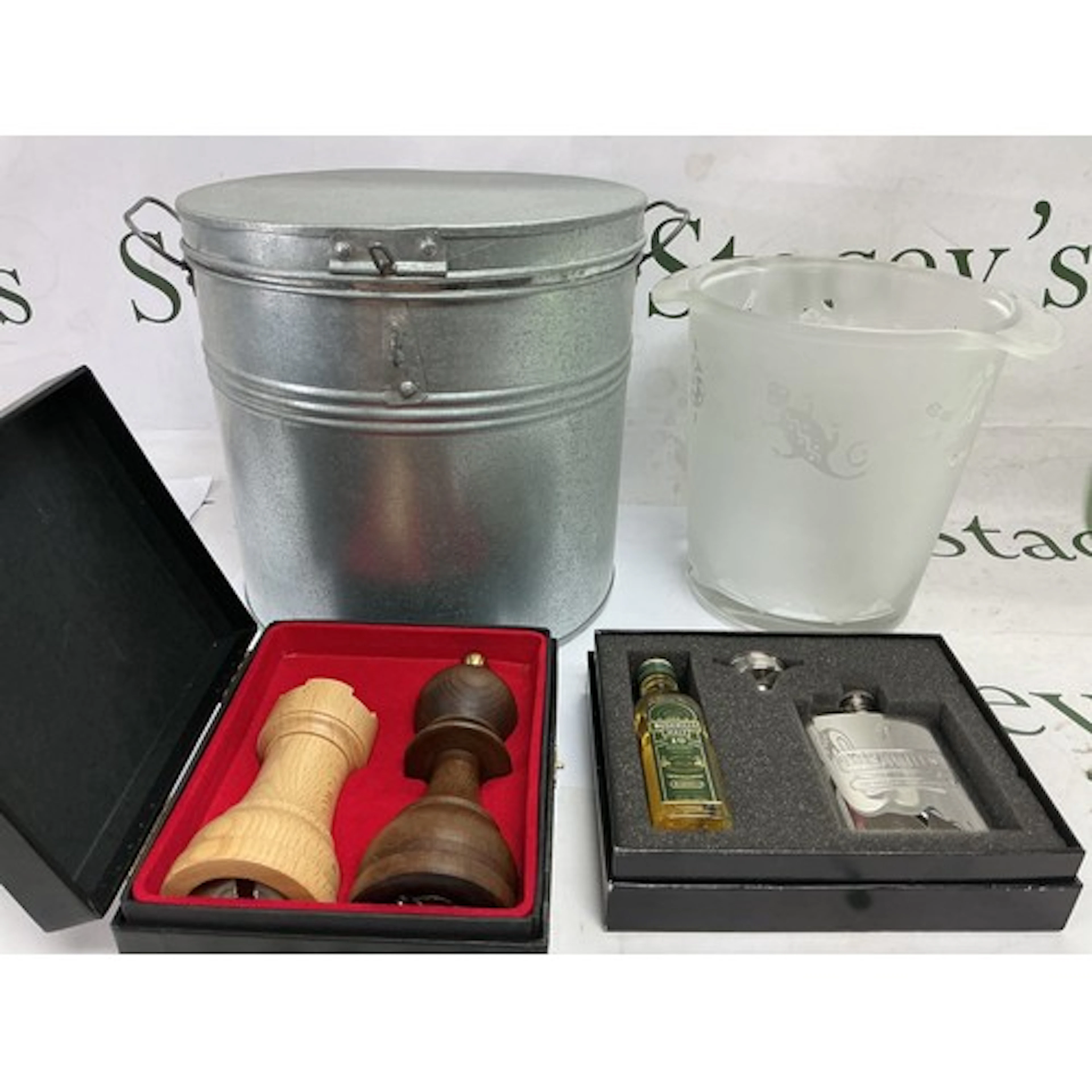 An ice bucket, boxed salt and pepper set modelled as chess p...