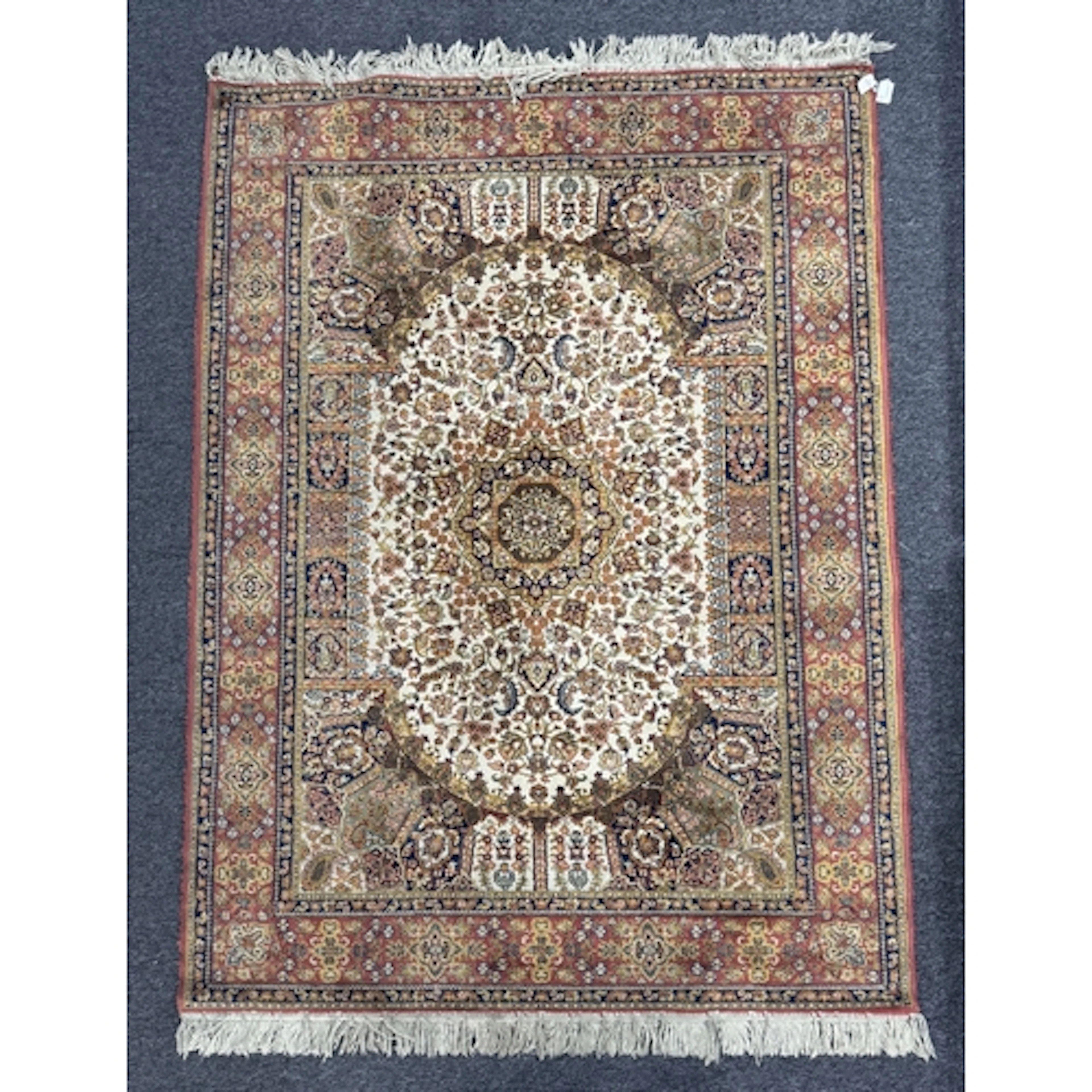 Rugs & Carpets: Persian Tabriz rug, the central field sh...