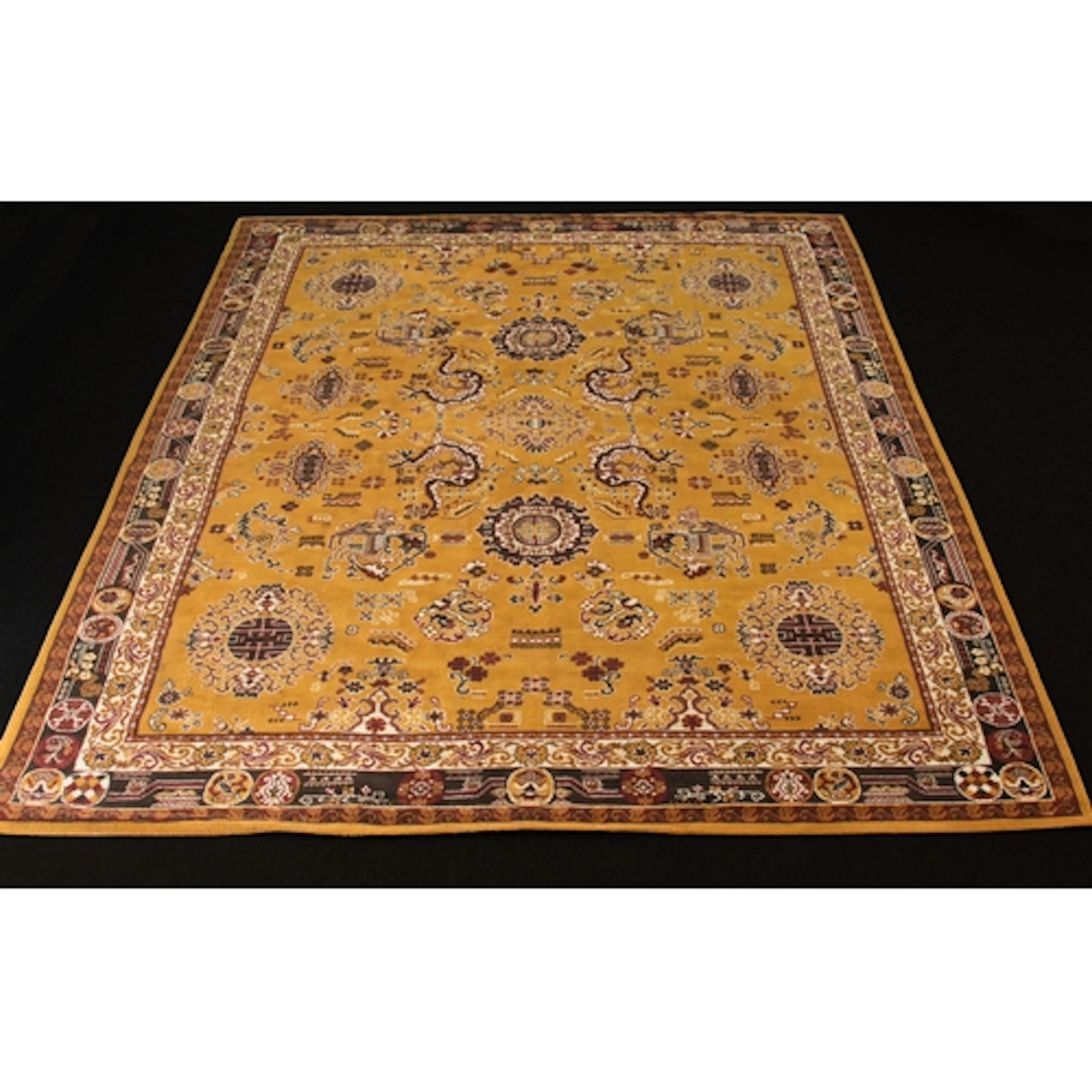 A machine-made Chinese style wool rug - the mustard yellow g...