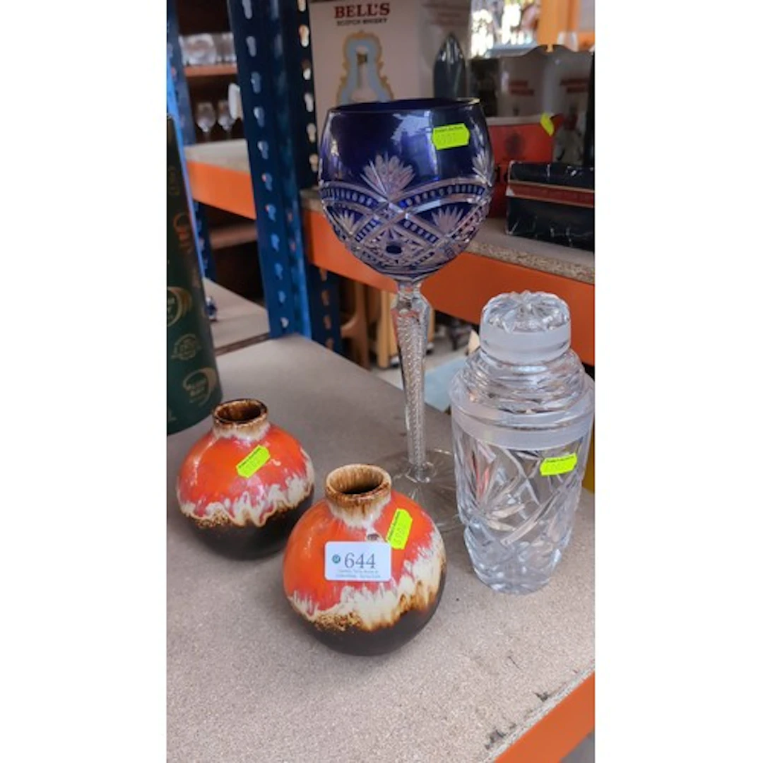 A pair of globular ceramic vases with orange, cream and brow...