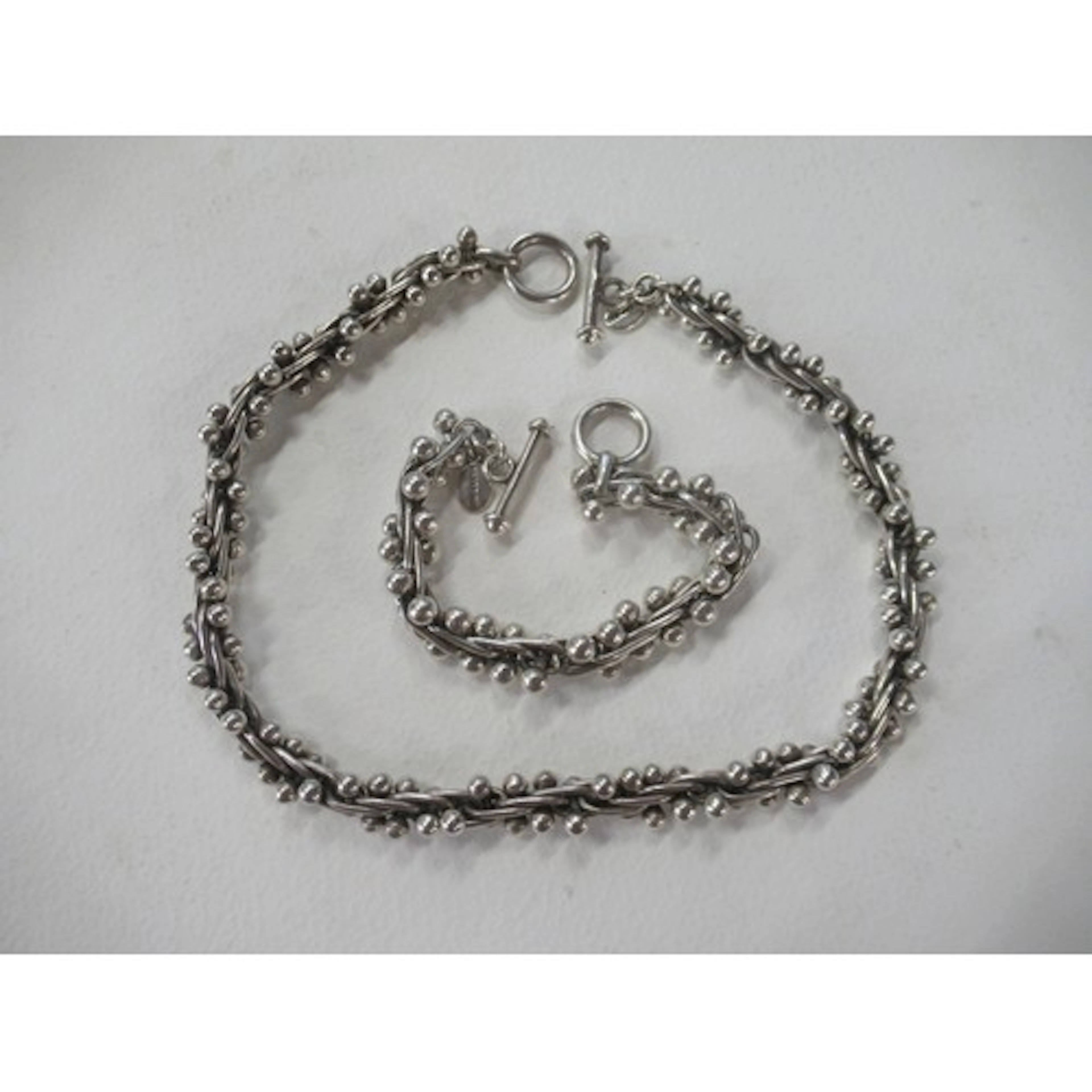 SILVARIOVS, A sterling silver 'Berries' pattern necklace and...
