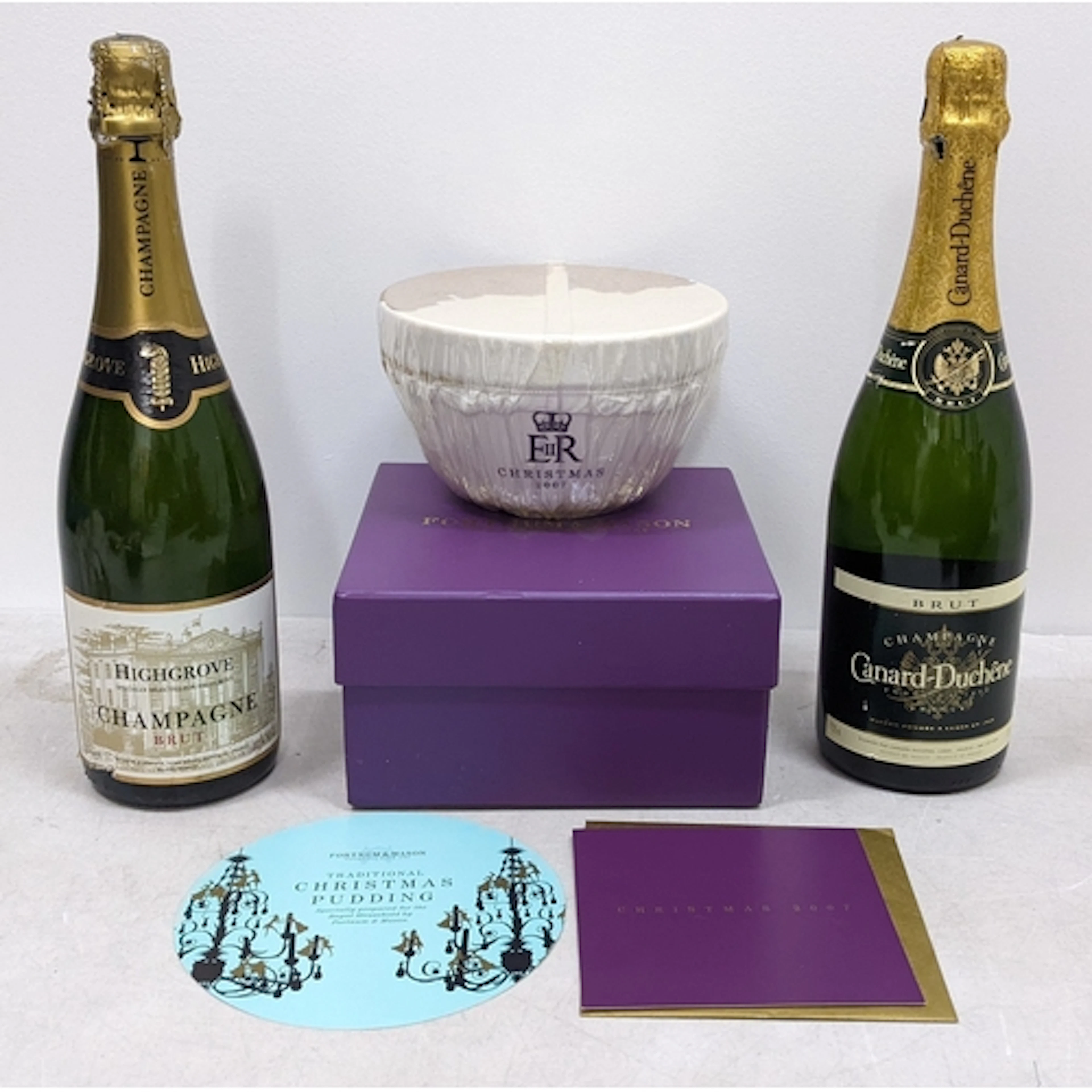 Two bottles of champagne and a Fortnum & Mason Christmas pud...