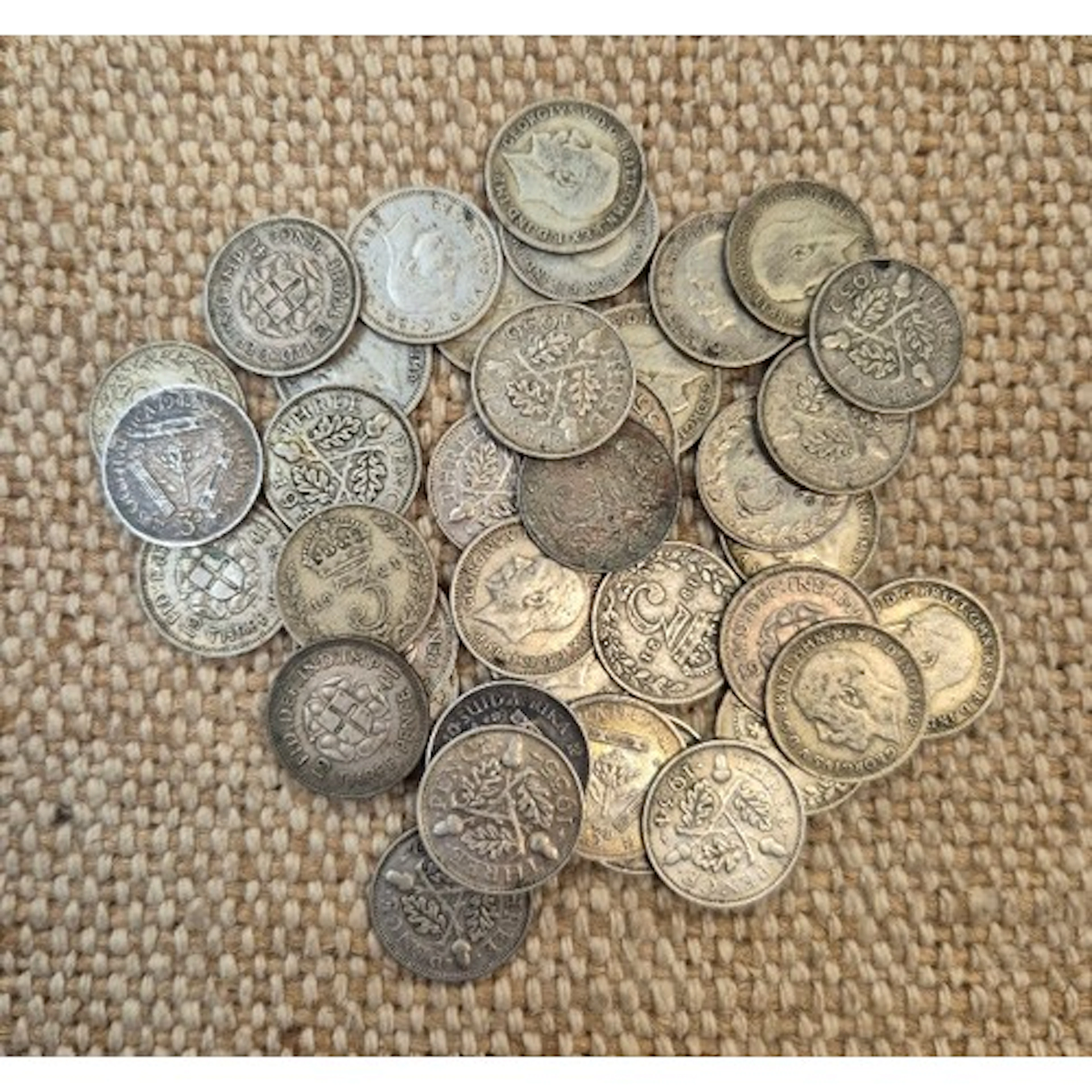 A group of assorted silver threepences dated 1920 to 1946.