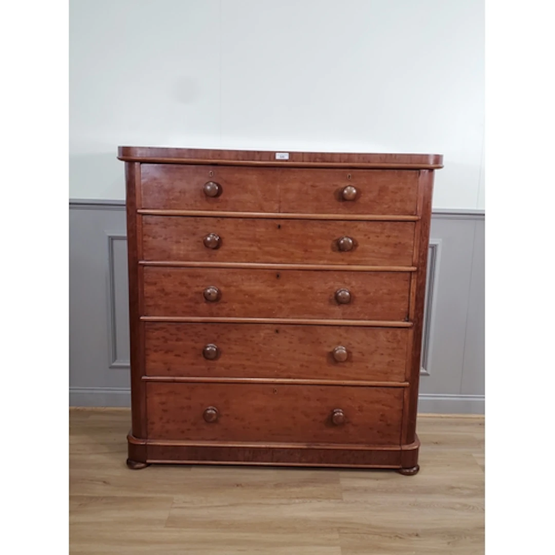 A mahogany Chest of Drawers fitted two short over four long ...