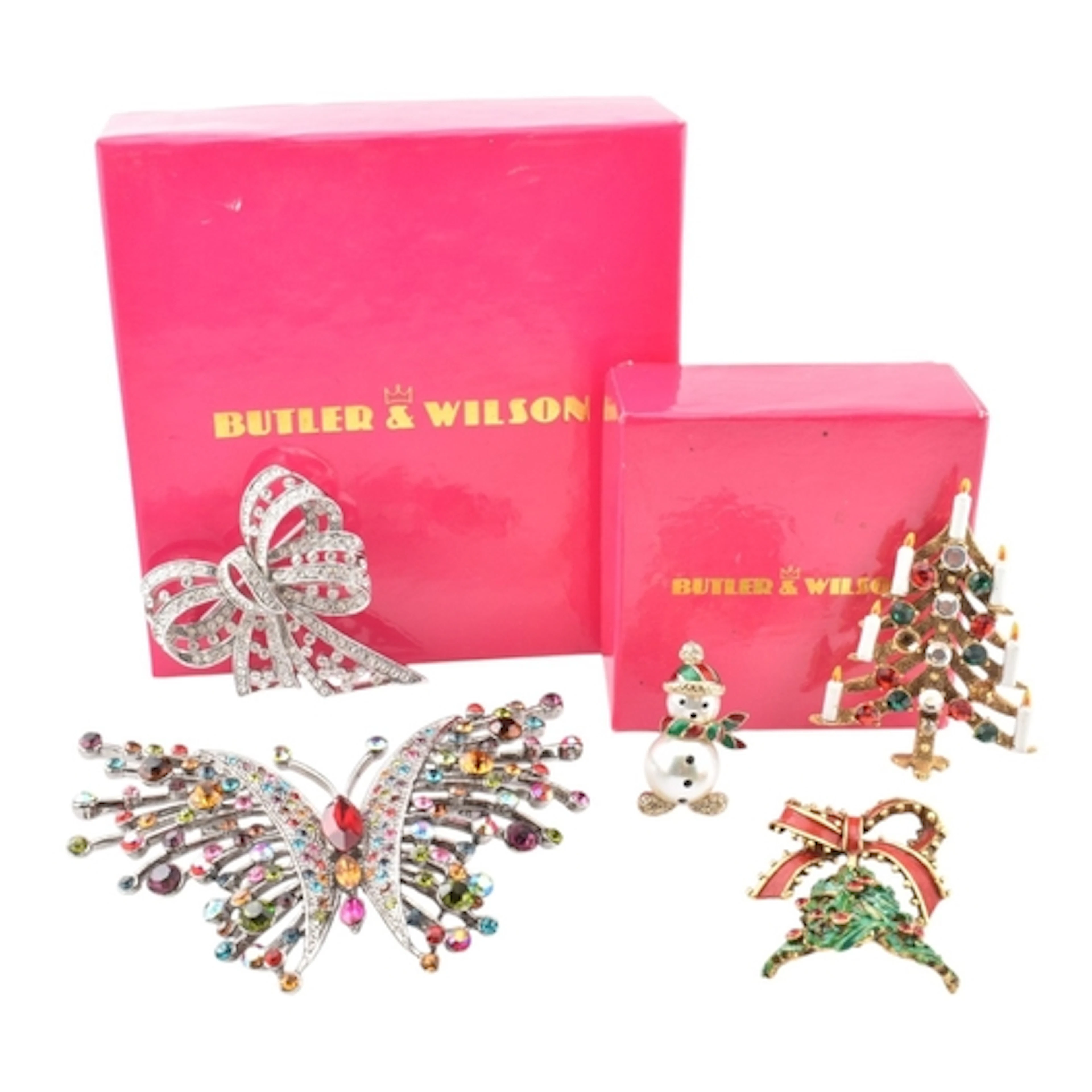 A selection of Butler and Wilson brooches. Five brooches to ...