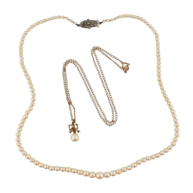 A hallmarked 9ct gold and pearl pendant necklace together wi...