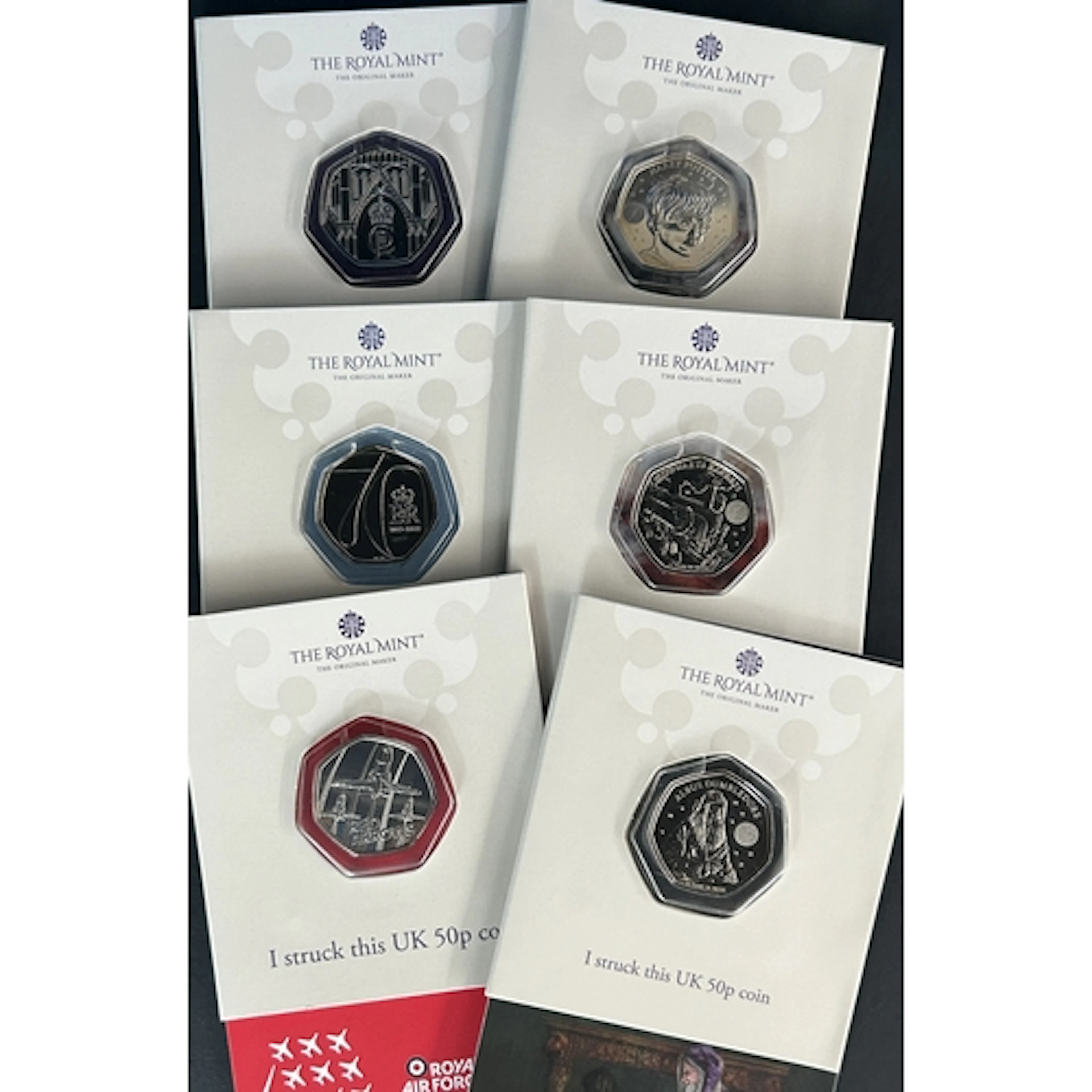 A group of six Great Britain Royal Mint Strike Your Own coin...