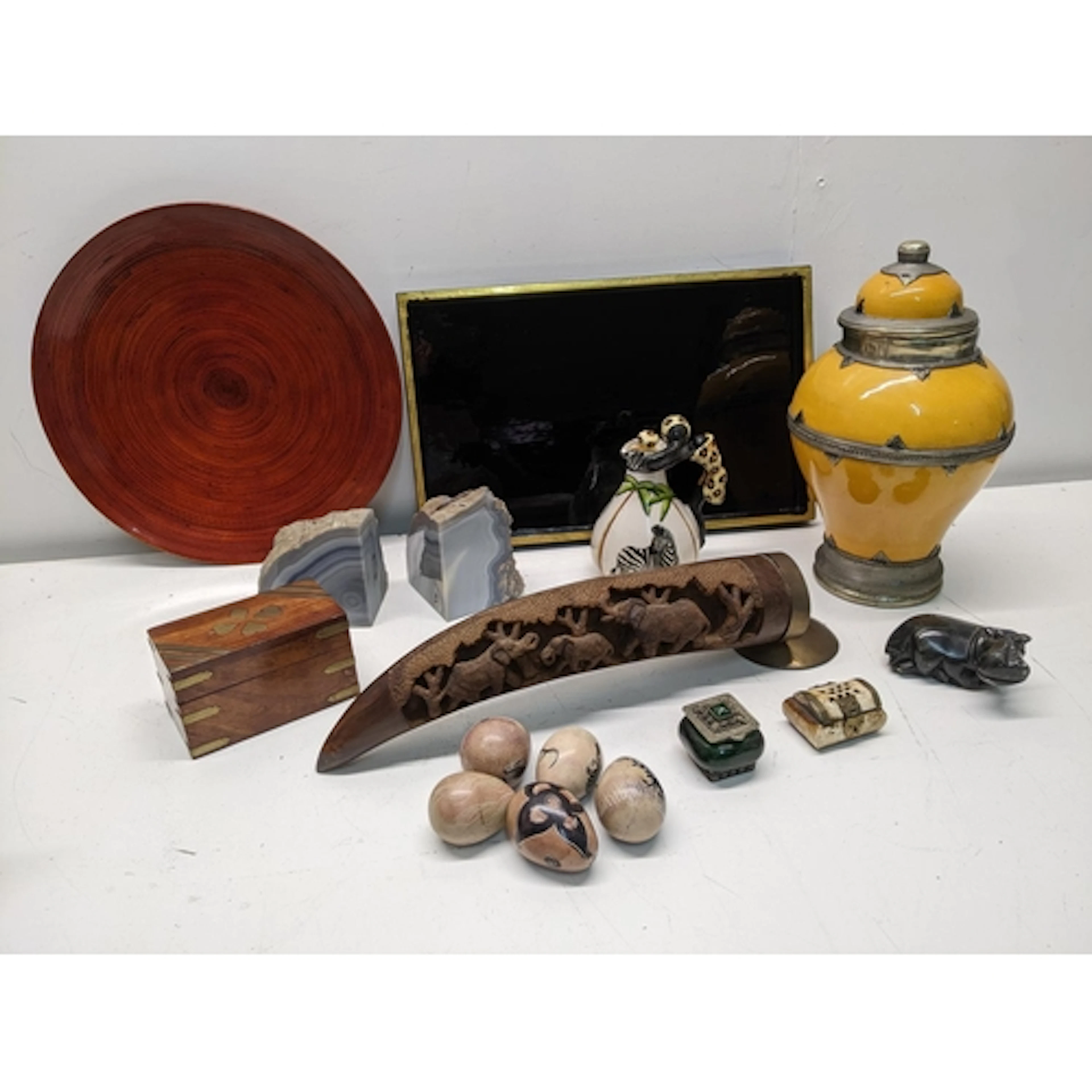 A mixed group of ethnographical ornaments to include, a Moro...