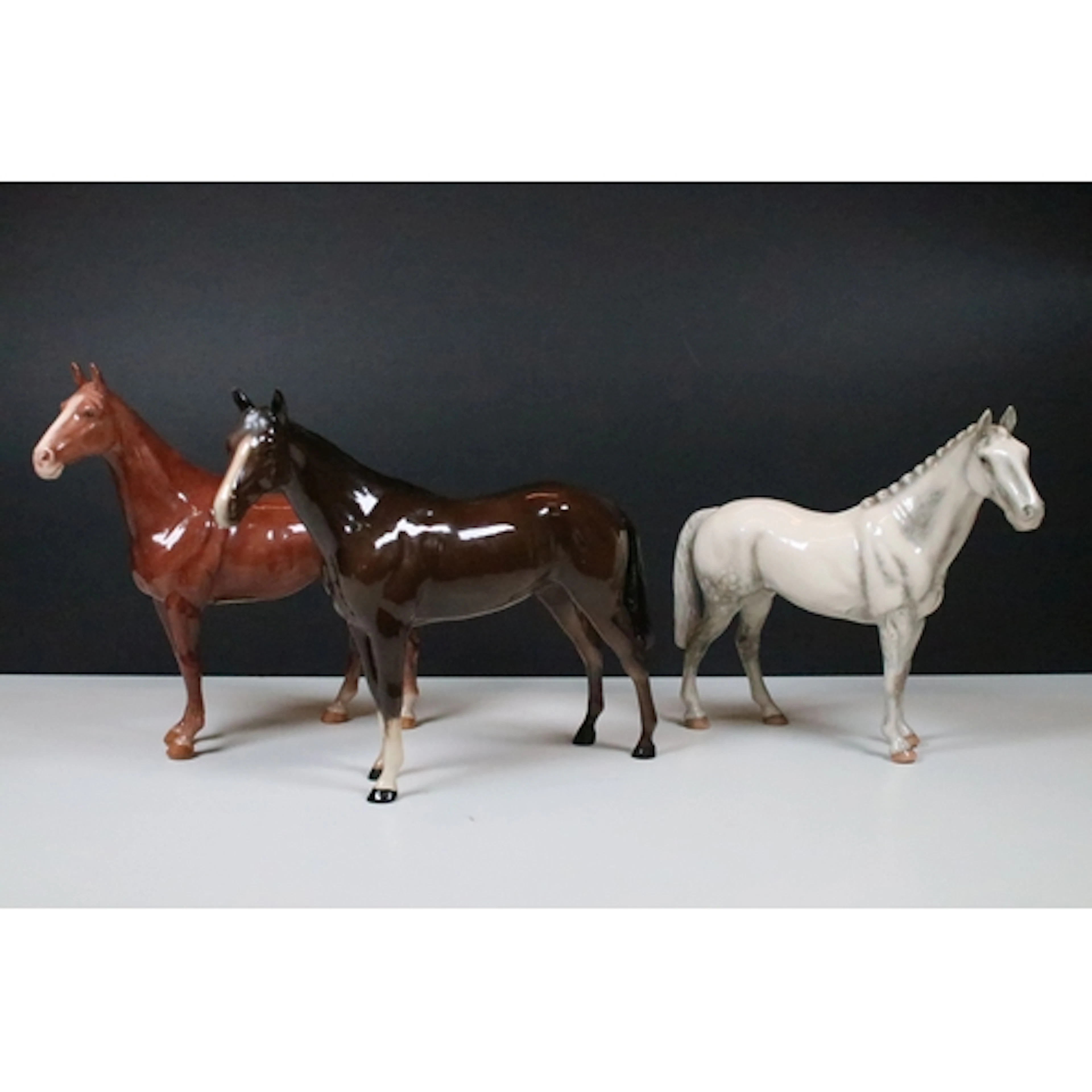 Group of three boxed Royal Doulton figures of horses, to com...