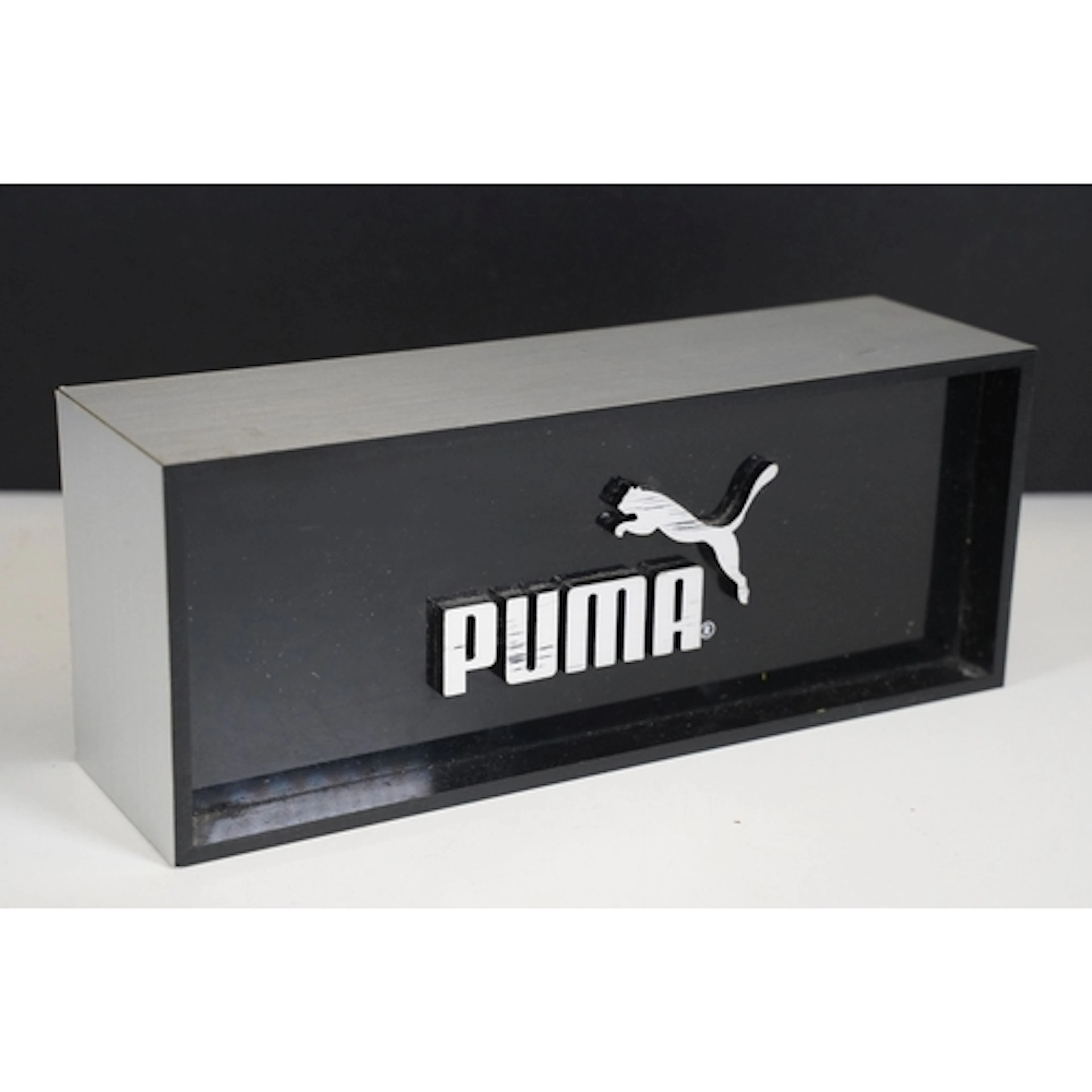 Puma advertising sign, of rectangular form with PUMA written...
