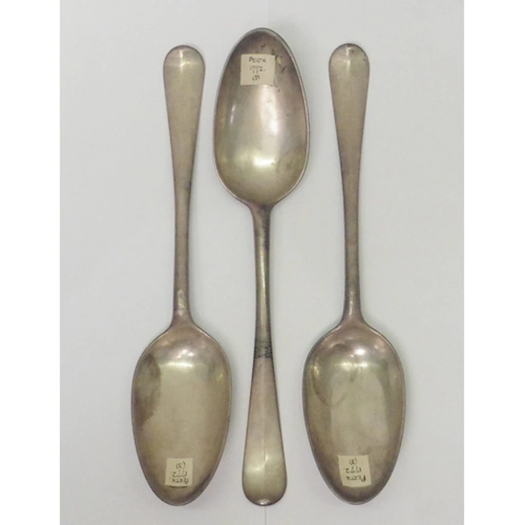 Three George III Scottish silver rat tailed table spoons, Ja...